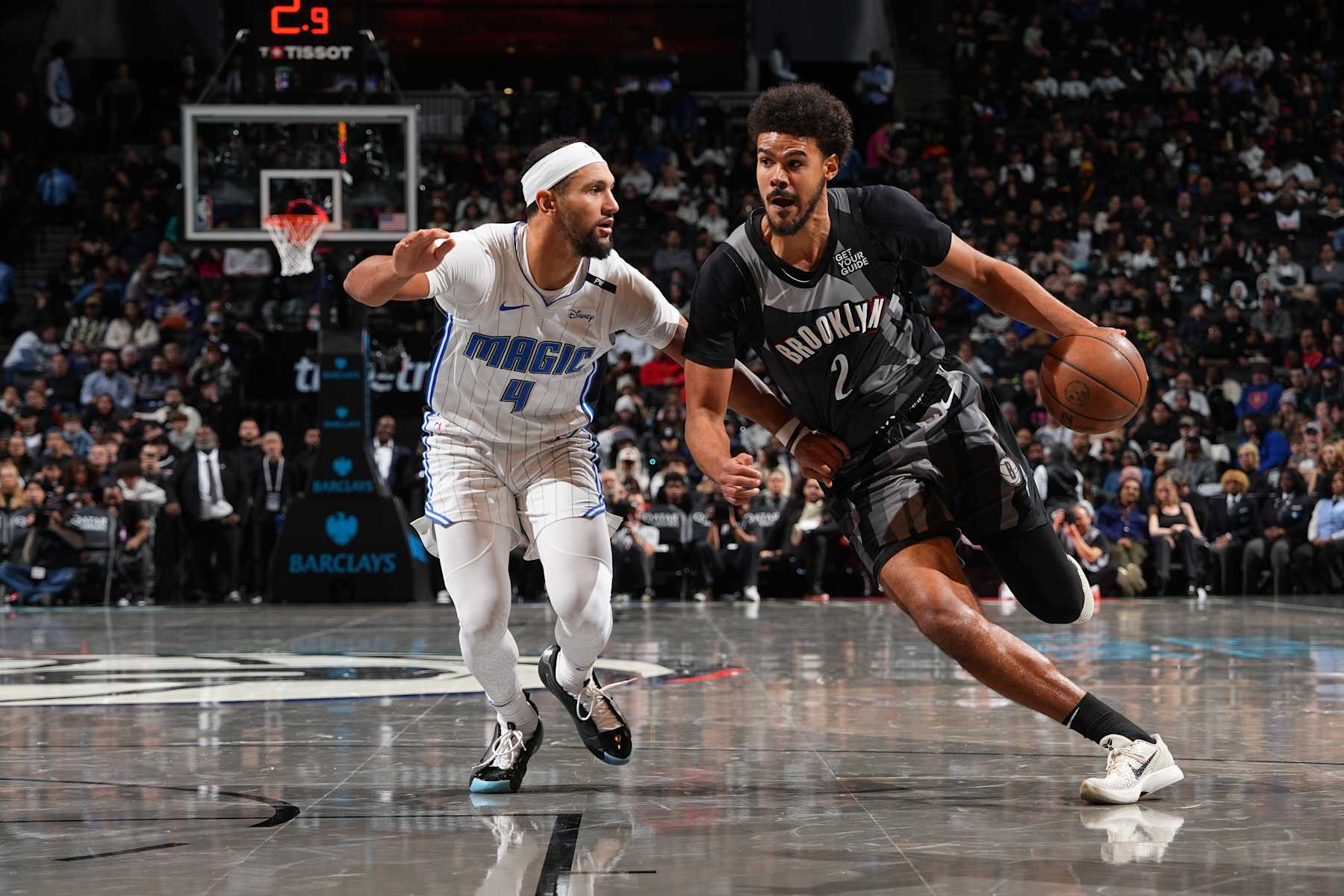 BROOKLYN, NY - DECEMBER 1: Cameron Johnson #2 of the Brooklyn Nets drives to the basket during the game against the Orlando Magic on December 1, 2024 at Barclays Center in Brooklyn, New York. NOTE TO USER: User expressly acknowledges and agrees that, by downloading and or using this Photograph, user is consenting to the terms and conditions of the Getty Images License Agreement. Mandatory Copyright Notice: Copyright 2024 NBAE (Photo by Jesse D. Garrabrant/NBAE via Getty Images)