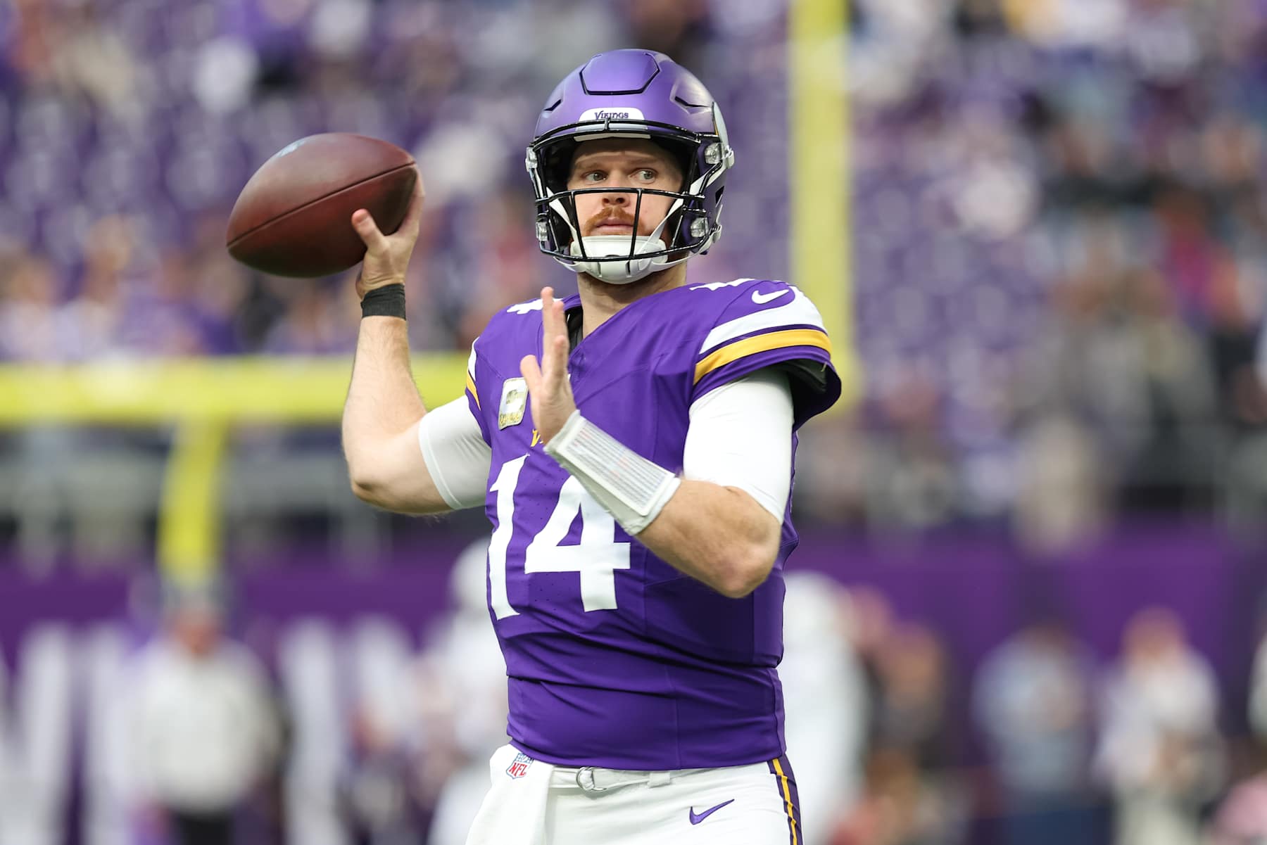 MINNEAPOLIS, MN - DECEMBER 01: Minnesota Vikings quarterback Sam Darnold (14) warms up before the NFL game between the Arizona Cardinals and the Minnesota Vikings on December 1st, 2024, at U.S. Bank Stadium in Minneapolis, MN. (Photo by Bailey Hillesheim/Icon Sportswire via Getty Images)