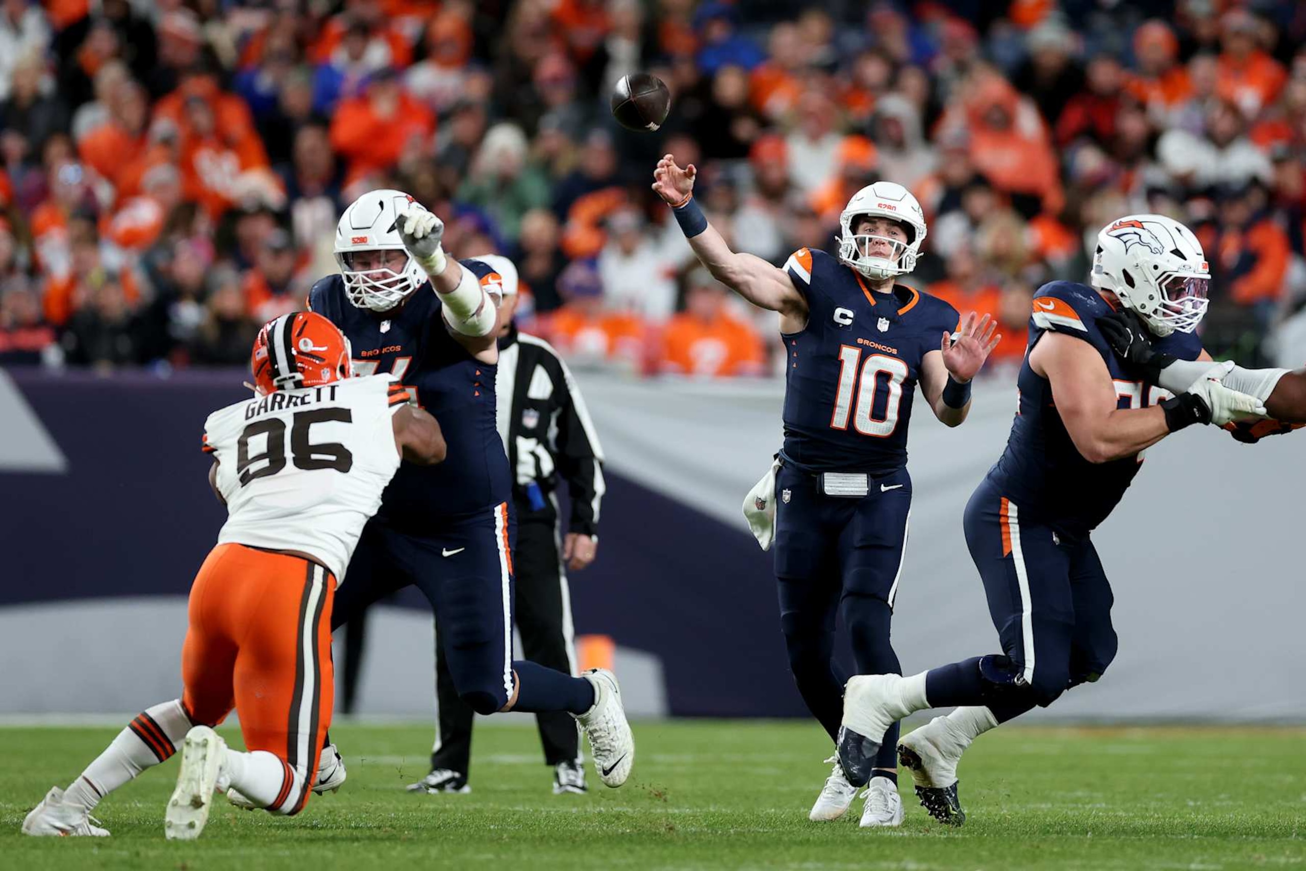 DENVER, COLORADO - DECEMBER 02: Bo Nix #10 of the Denver Broncos passes the ball during the second quarter in the game against the Cleveland Browns at Empower Field At Mile High on December 02, 2024 in Denver, Colorado. (Photo by Matthew Stockman/Getty Images)