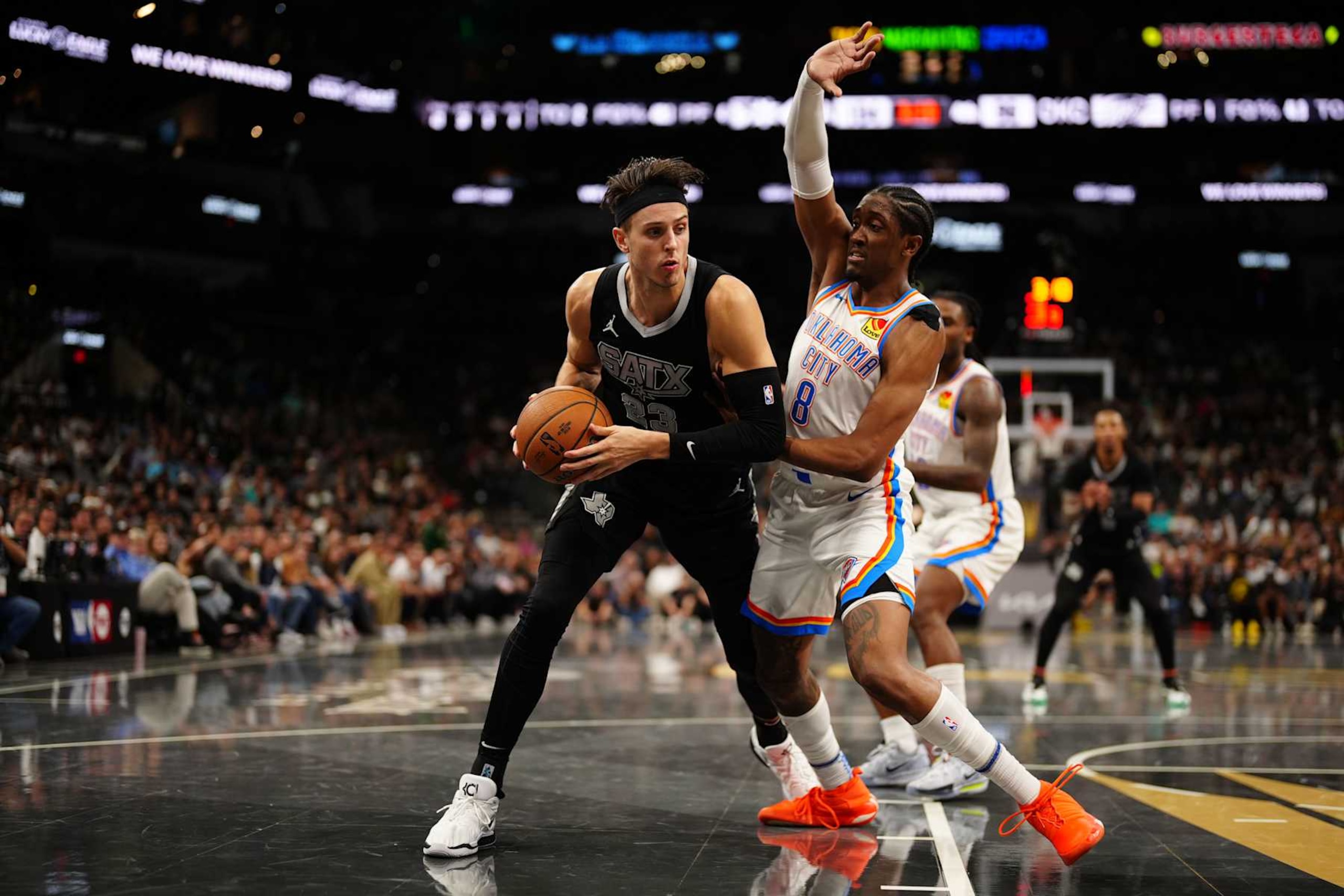 SAN ANTONIO, TX - NOVEMBER 19: Zach Collins #23 of the San Antonio Spurs handles the ball during the game against the Oklahoma City Thunder during the Emirates NBA Cup game on November 19, 2024 at the Frost Bank Center in San Antonio, Texas. NOTE TO USER: User expressly acknowledges and agrees that, by downloading and or using this photograph, user is consenting to the terms and conditions of the Getty Images License Agreement. Mandatory Copyright Notice: Copyright 2024 NBAE (Photos by Darren Carroll/NBAE via Getty Images)