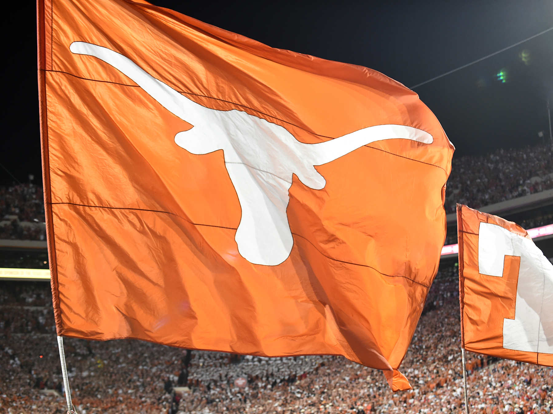 AUSTIN, TX - OCTOBER 19: A Texas Longhorn flag with the Longhorn logo flies during the college football game between the Georgia Bulldogs and the Texas Longhorns on October 19, 2024, at Darrell K Royal- Texas Memorial Stadium in Austin, TX. (Photo by Jeffrey Vest/Icon Sportswire via Getty Images)