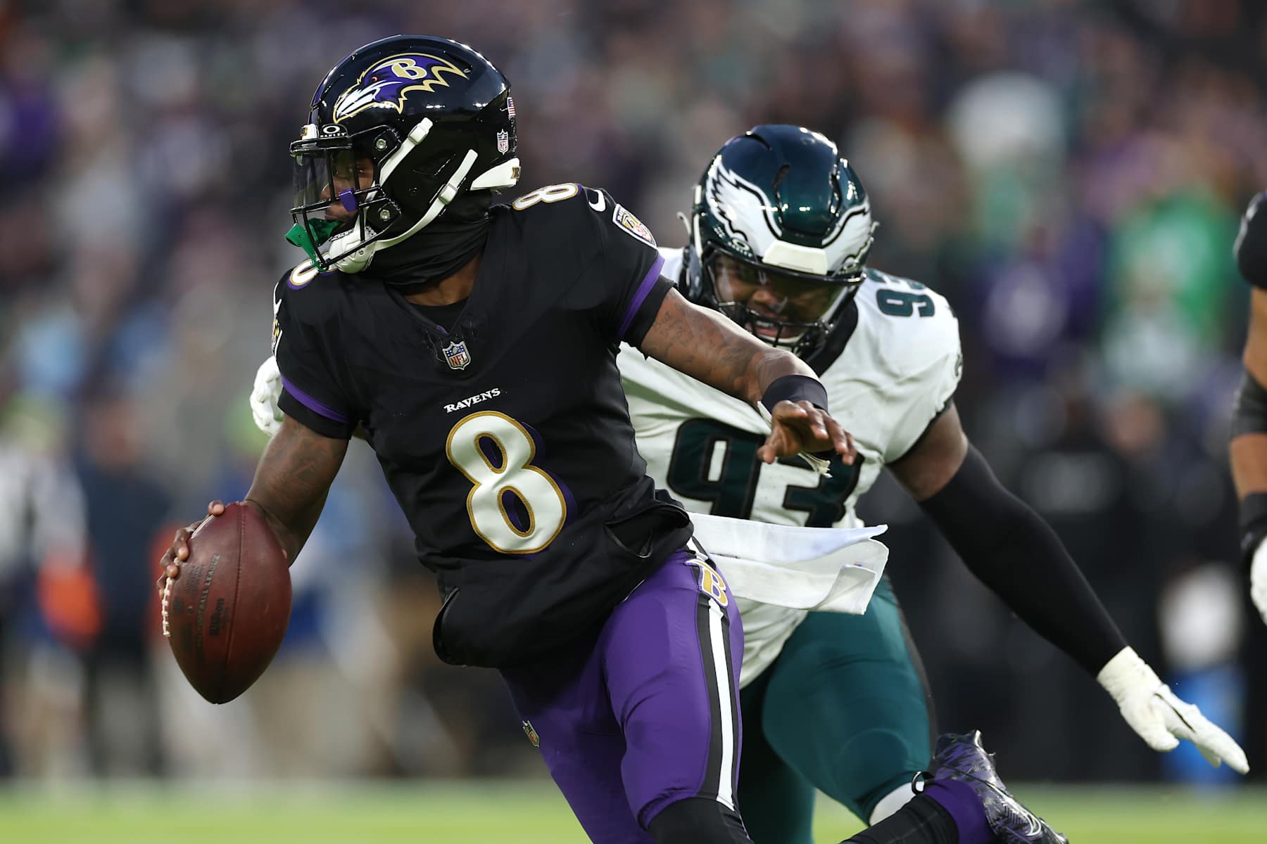 BALTIMORE, MARYLAND - DECEMBER 01: Lamar Jackson #8 of the Baltimore Ravens scrambles with the ball during the first quarter against the Philadelphia Eagles at M&T Bank Stadium on December 01, 2024 in Baltimore, Maryland. (Photo by Patrick Smith/Getty Images)