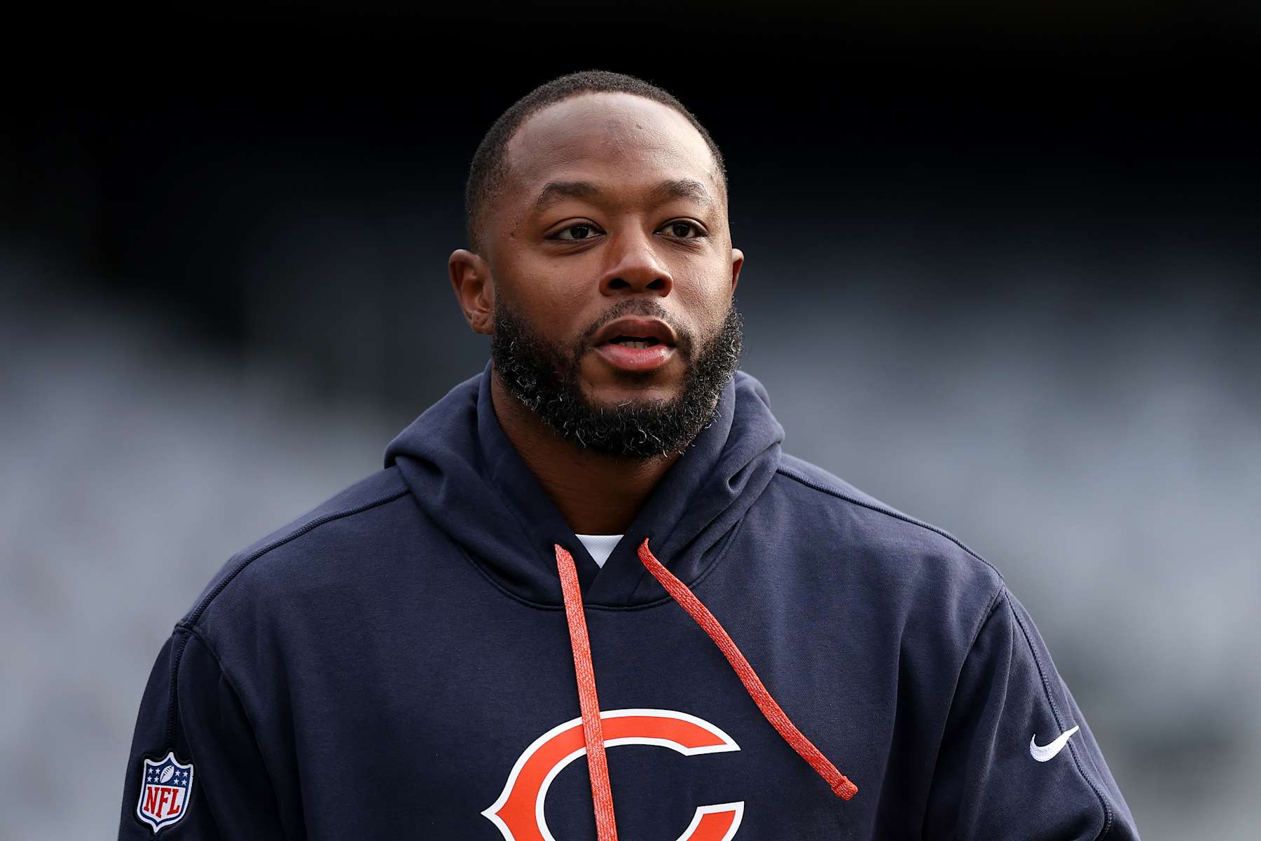 CHICAGO, ILLINOIS - NOVEMBER 24: Offensive coordinator Thomas Brown of the Chicago Bears looks on before the game against the Minnesota Vikings at Soldier Field on November 24, 2024 in Chicago, Illinois. (Photo by Luke Hales/Getty Images)