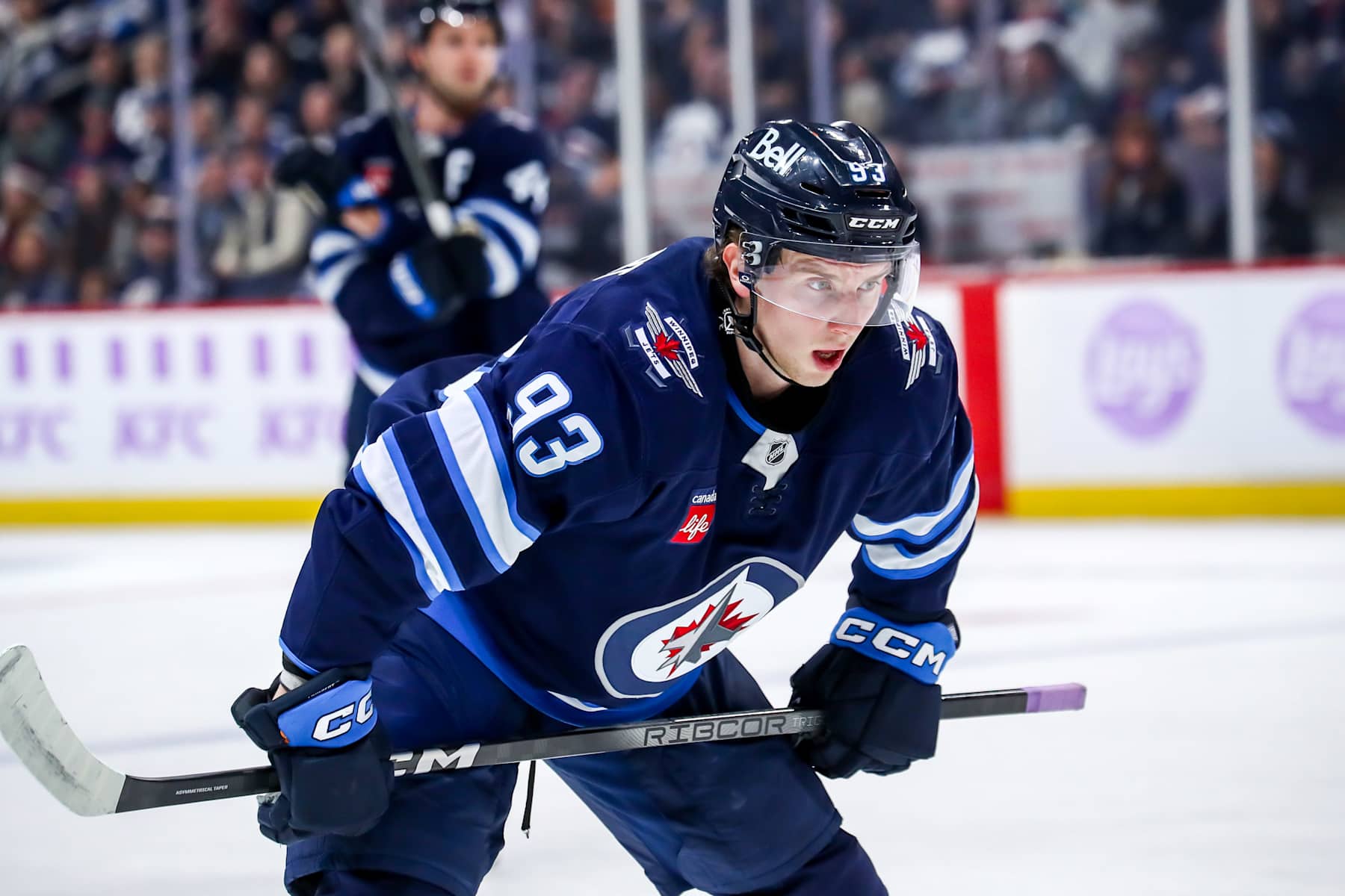 WINNIPEG, CANADA - DECEMBER 3: Brad Lambert #93 of the Winnipeg Jets looks on as he gets set to take a first period face-off against the St. Louis Blues at the Canada Life Centre on December 3, 2024 in Winnipeg, Manitoba, Canada. (Photo by Darcy Finley/NHLI via Getty Images)