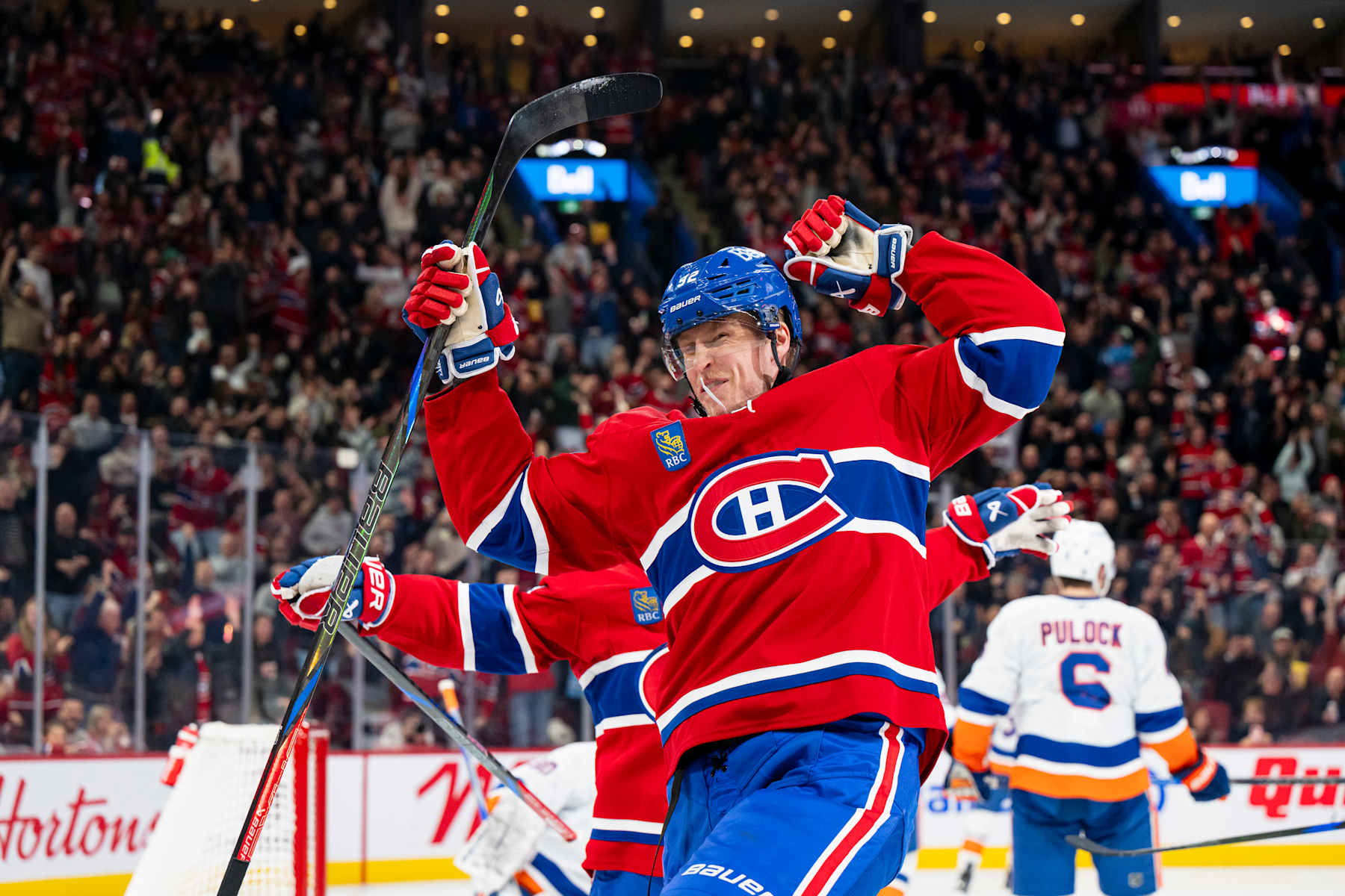 MONTREAL, CANADA- DECEMBER 3: Patrik Laine #92 of the Montreal Canadiens celebrates after scoring a goal during the second period of the NHL regular season game between the Montreal Canadiens and the New York Islanders at the Bell Centre on December 3, 2024 in Montreal, Quebec, Canada. (Photo by Matt Garies/NHLI via Getty Images)
