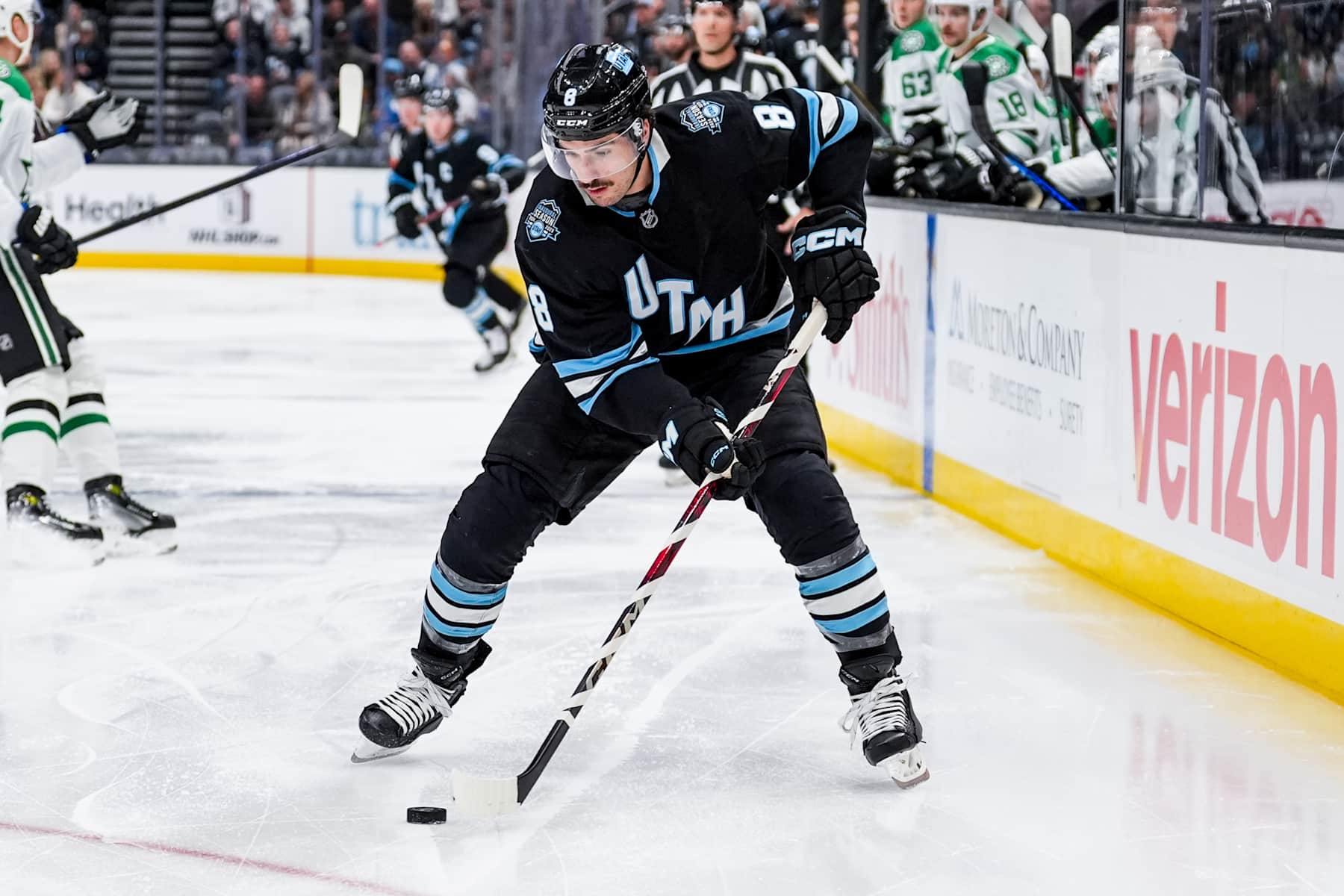 SALT LAKE CITY, UTAH - DECEMBER 2: Nick Schmaltz #8 of the Utah Hockey Club skates with the puck during the first period against the Dallas Stars on December 2, 2024 at Delta Center in Salt Lake City, Utah. (Photo by Hunter Dyke/NHLI via Getty Images)