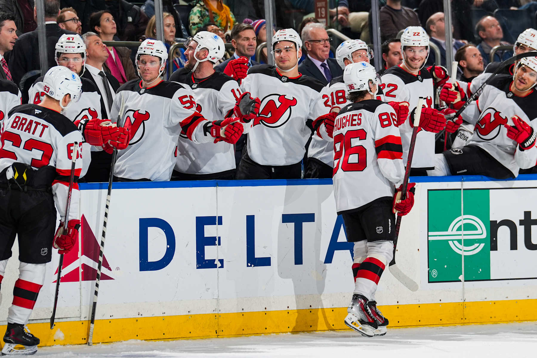 NEW YORK, NEW YORK - DECEMBER 02: Jack Hughes #86 of the New Jersey Devils celebrates with teammates after scoring a goal in the second period against the New York Rangers at Madison Square Garden on December 2, 2024 in New York City. (Photo by Jared Silber/NHLI via Getty Images)