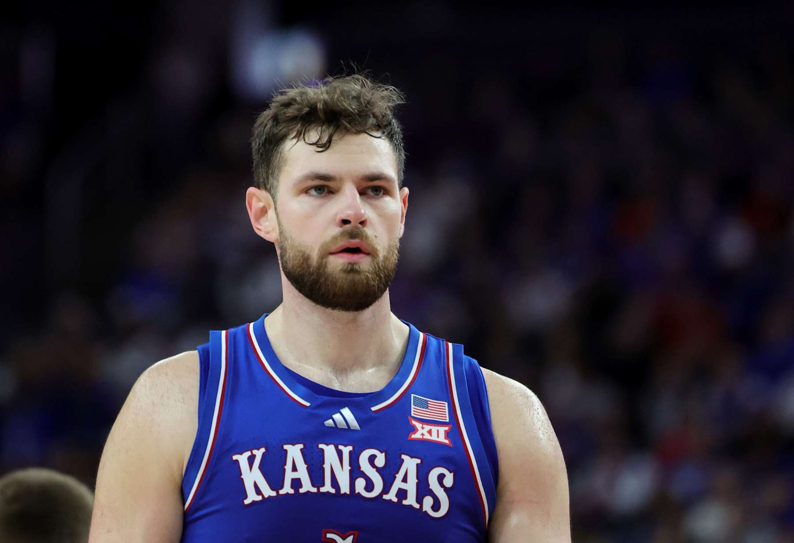 LAS VEGAS, NEVADA - NOVEMBER 26: Hunter Dickinson #1 of the Kansas Jayhawks walks on the court during a break in the first half of a game against the Duke Blue Devils during the Vegas Showdown at T-Mobile Arena on November 26, 2024 in Las Vegas, Nevada. The Jayhawks defeated the Blue Devils 75-72. (Photo by Ethan Miller/Getty Images)