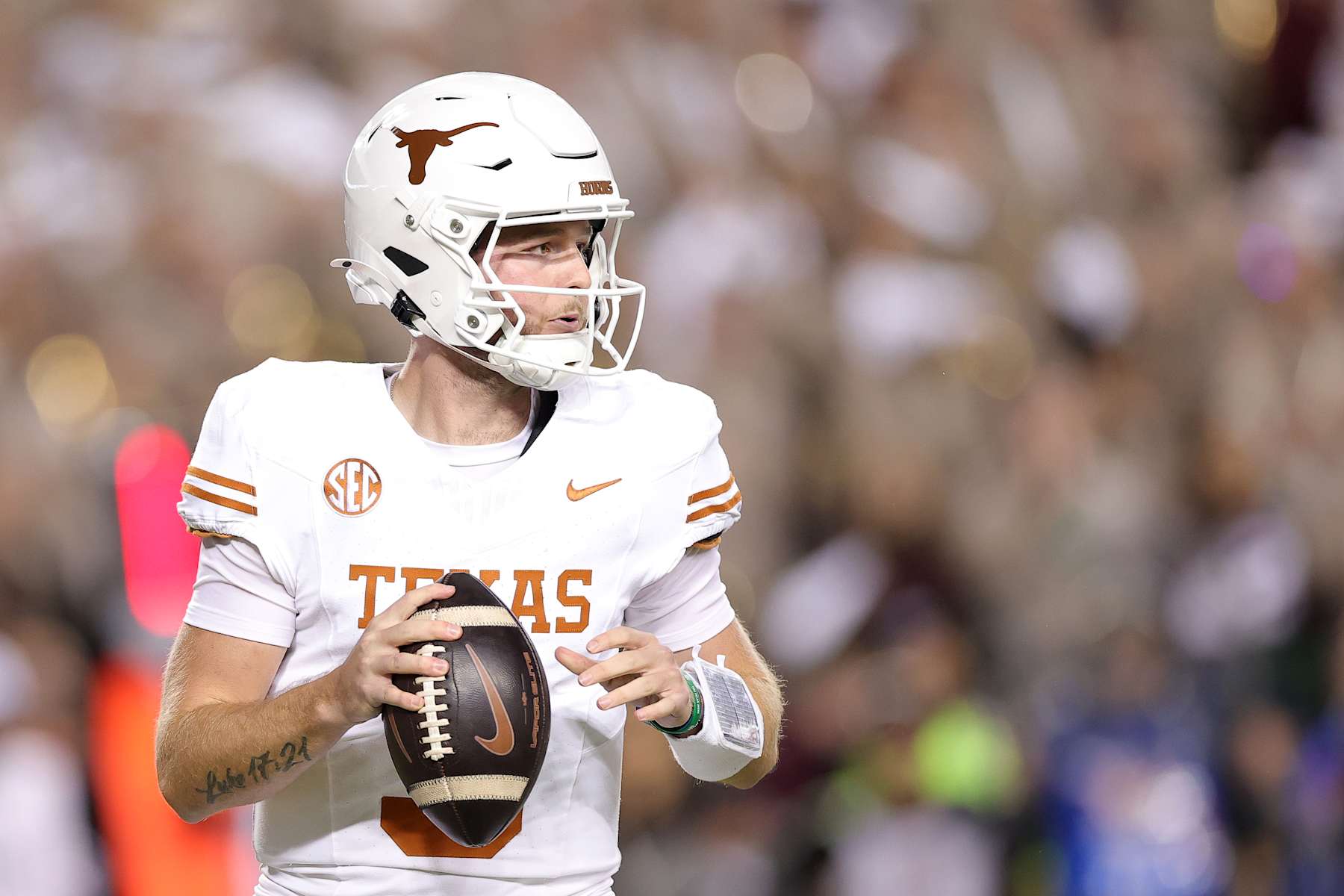 COLLEGE STATION, TEXAS - NOVEMBER 30: Quinn Ewers #3 of the Texas Longhorns looks to pass against the Texas A&M Aggies during the first half at Kyle Field on November 30, 2024 in College Station, Texas. (Photo by Alex Slitz/Getty Images)