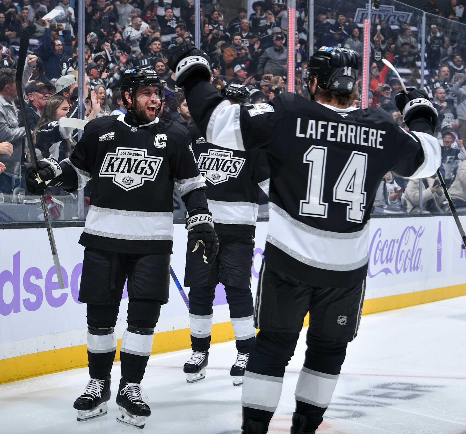 LOS ANGELES, CA - NOVEMBER 27: Anze Kopitar #11 of the Los Angeles Kings celebrates his goal with Alex Laferriere #14 during the first period against the Winnipeg Jets at Crypto.com Arena on November 27, 2024 in Los Angeles, California. (Photo by Juan Ocampo/NHLI via Getty Images)