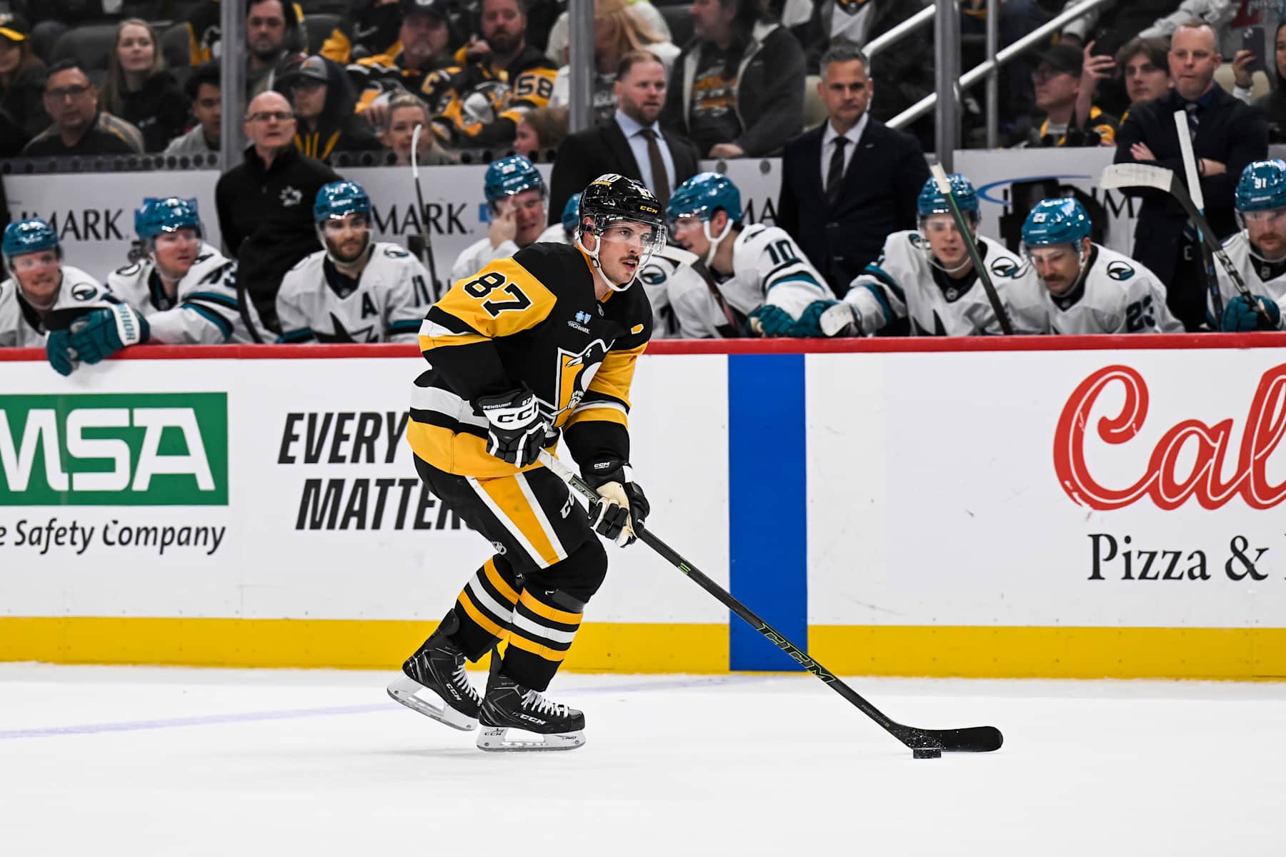PITTSBURGH, PA - NOVEMBER 16: Pittsburgh Penguins center Sidney Crosby (87) skates with the puck during the shootout in the NHL game between the Pittsburgh Penguins and the San Jose Sharks on November 16, 2024, at PPG Paints Arena in Pittsburgh, PA. (Photo by Jeanine Leech/Icon Sportswire via Getty Images)