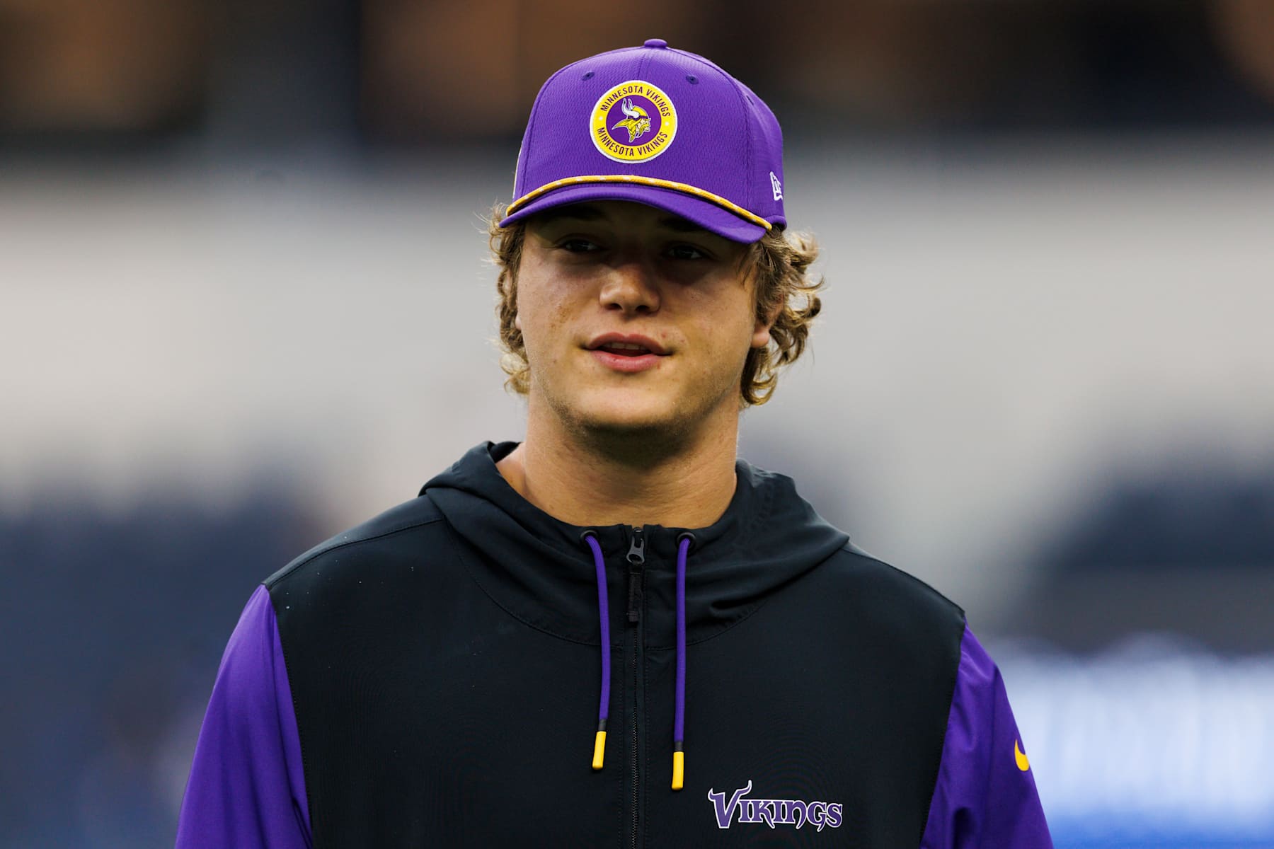 INGLEWOOD, CALIFORNIA - OCTOBER 24: J.J. McCarthy #9 of the Minnesota Vikings looks on the field before a game against Los Angeles Rams at SoFi Stadium on October 24, 2024 in Inglewood, California. (Photo by Ric Tapia/Getty Images)
