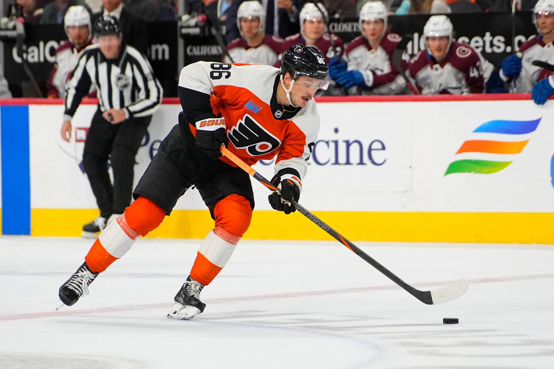 PHILADELPHIA, PA - NOVEMBER 18: Philadelphia Flyers Left Wing Joel Farabee (86) skates with the puck during the second period of the National Hockey League game between the Colorado Avalanche and the Philadelphia Flyers on November 18, 2024, at the Wells Fargo Center in Philadelphia, PA. (Photo by Gregory Fisher/Icon Sportswire via Getty Images)