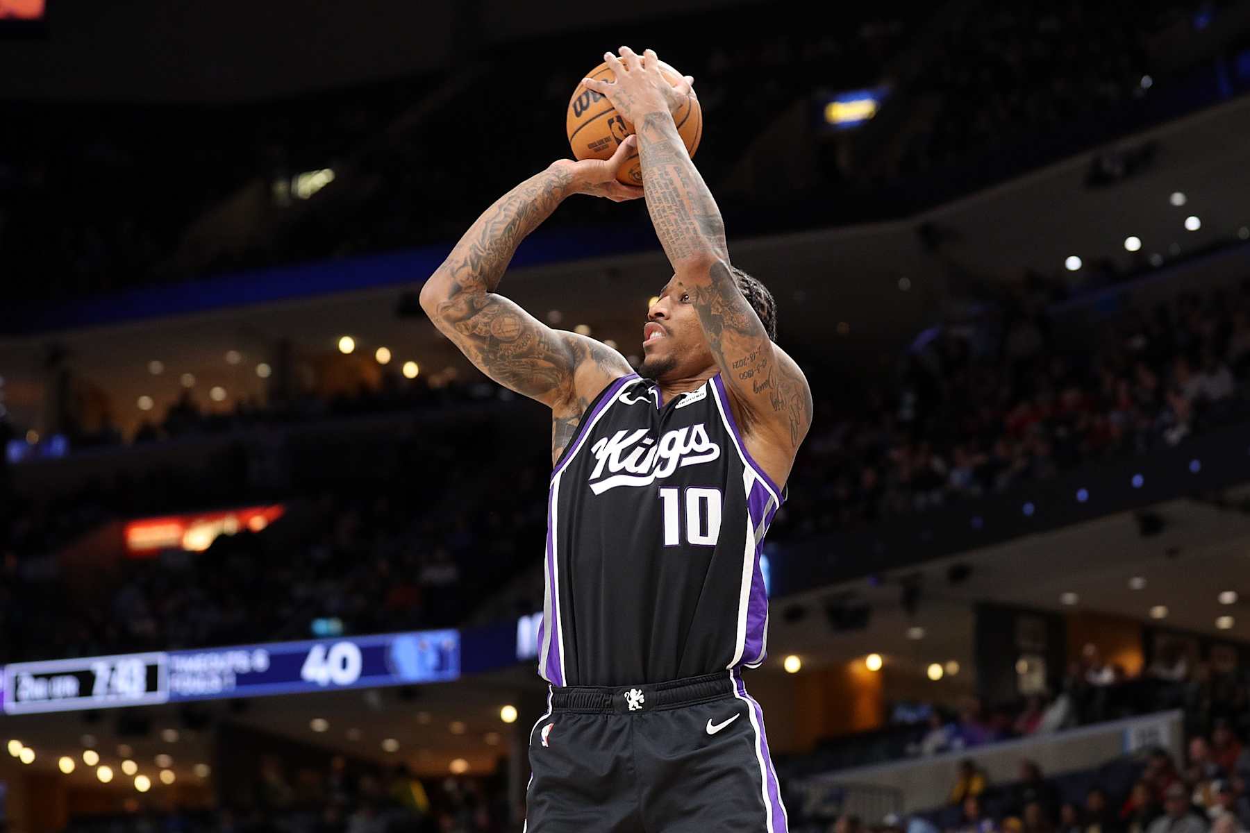MEMPHIS, TENNESSEE - DECEMBER 05: DeMar DeRozan #10 of the Sacramento Kings takes a shot during the first half against the Memphis Grizzlies at FedExForum on December 05, 2024 in Memphis, Tennessee. NOTE TO USER: User expressly acknowledges and agrees that, by downloading and or using this photograph, User is consenting to the terms and conditions of the Getty Images License Agreement. (Photo by Justin Ford/Getty Images)