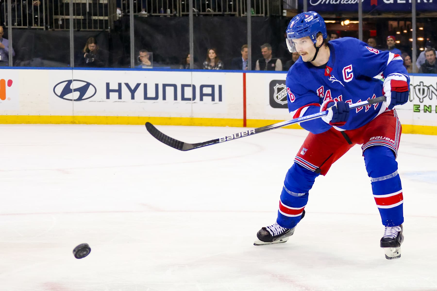 NEW YORK, NY - NOVEMBER 14: New York Rangers Defenseman Jacob Trouba (8) clears the zone during the first period of the National Hockey League game between the San Jose Sharks and the New York Rangers on November 14, 2024 at Madison Square Garden in New York, NY. (Photo by Joshua Sarner/Icon Sportswire via Getty Images)