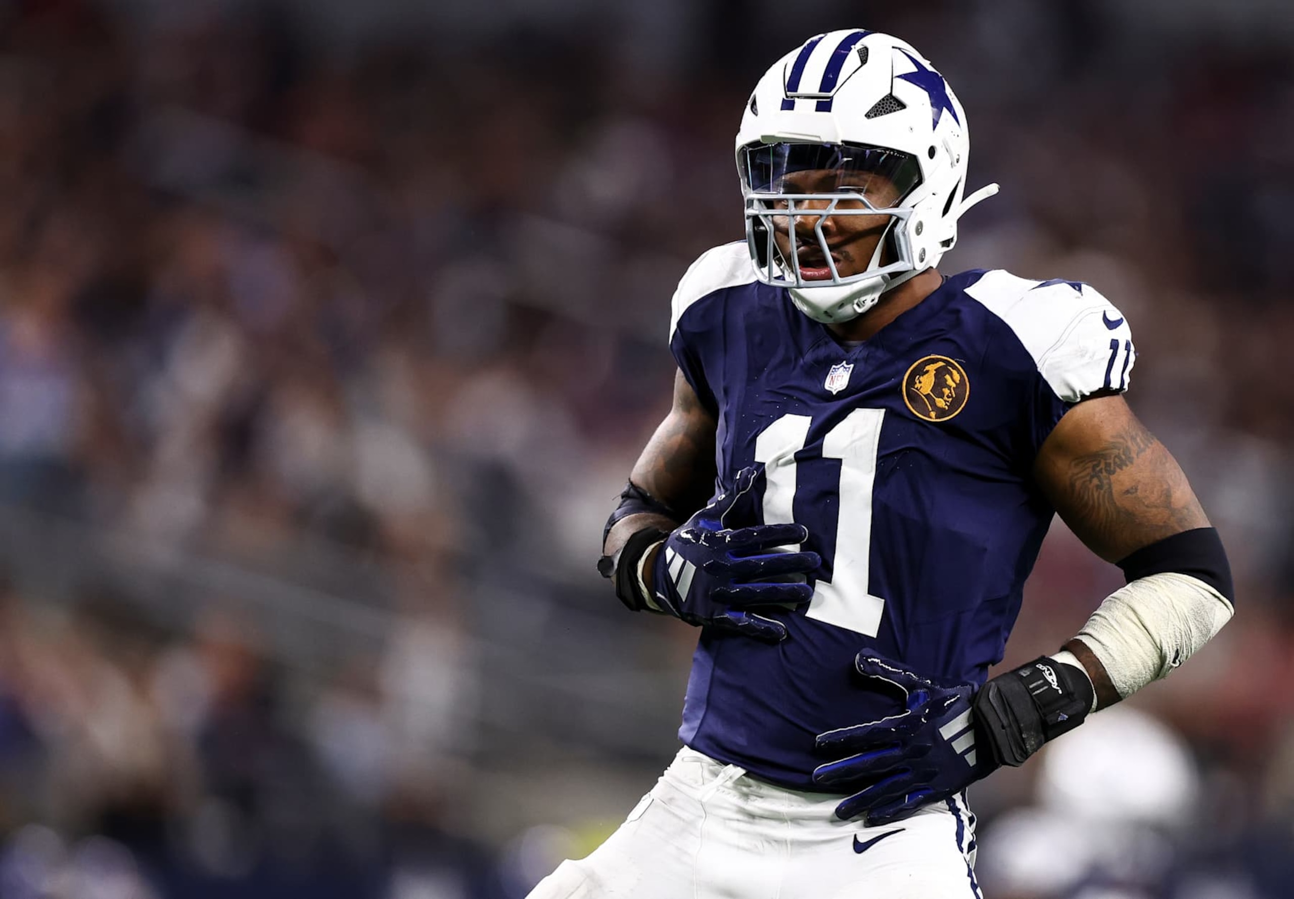 ARLINGTON, TEXAS - NOVEMBER 28: Micah Parsons #11 of the Dallas Cowboys celebrates after a sack during the second half of an NFL football game against the New York Giants at AT&T Stadium on November 28, 2024 in Arlington, Texas. (Photo by Kevin Sabitus/Getty Images)