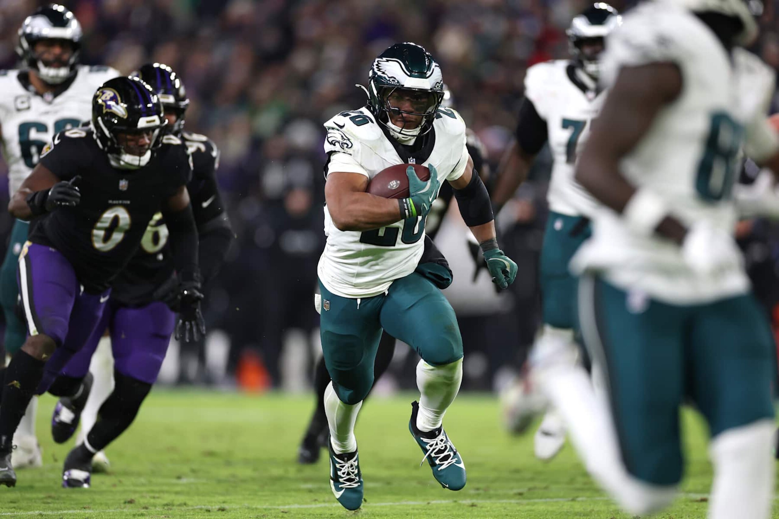 BALTIMORE, MARYLAND - DECEMBER 01: Saquon Barkley #26 of the Philadelphia Eagles runs the ball for a touchdown during the fourth quarter against the Baltimore Ravens at M&T Bank Stadium on December 01, 2024 in Baltimore, Maryland. (Photo by Patrick Smith/Getty Images)