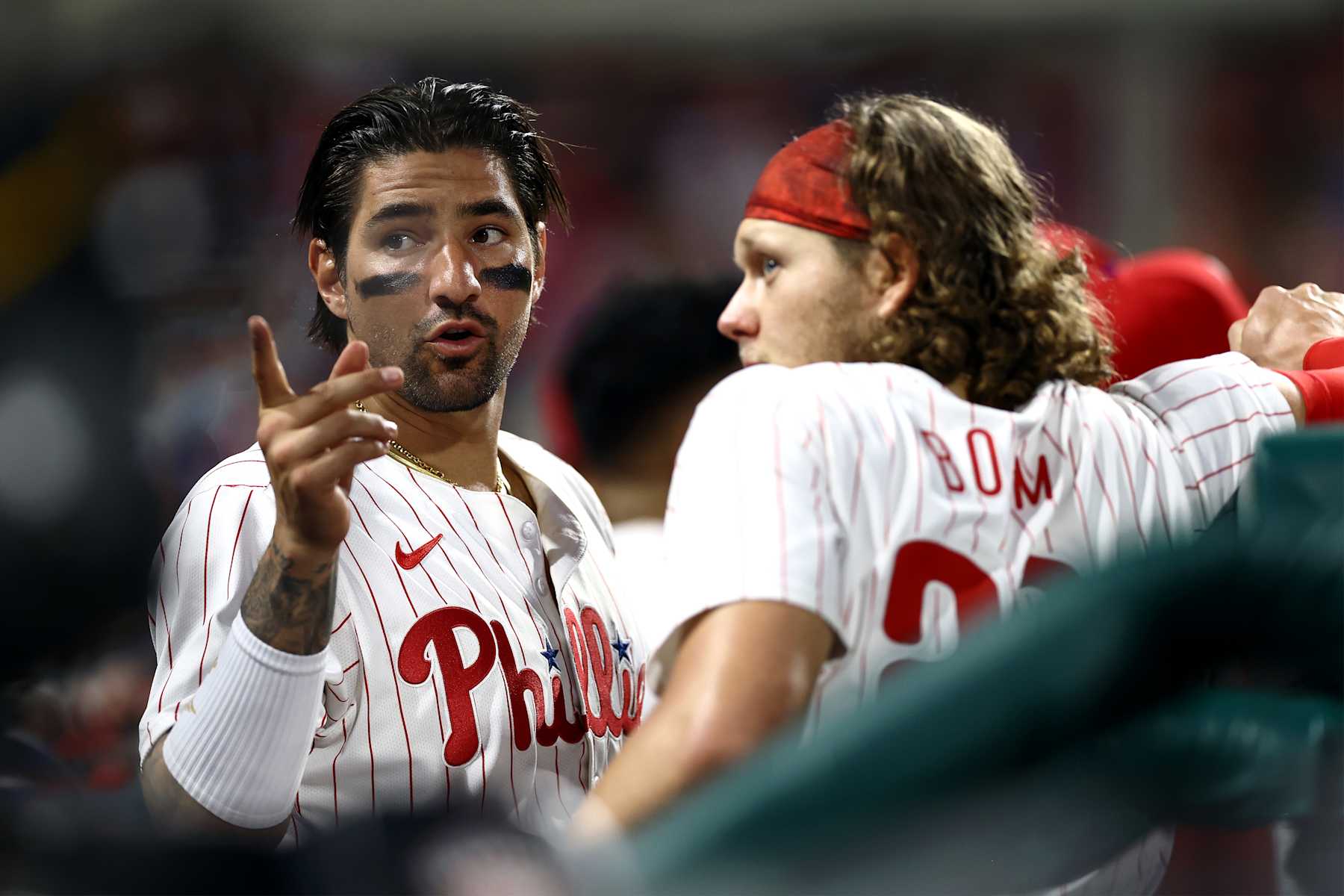 PHILADELPHIA, PENNSYLVANIA - MAY 21: Nick Castellanos #8 and Alec Bohm #28 of the Philadelphia Phillies during the seventh inning against the Texas Rangers at Citizens Bank Park on May 21, 2024 in Philadelphia, Pennsylvania. (Photo by Tim Nwachukwu/Getty Images)