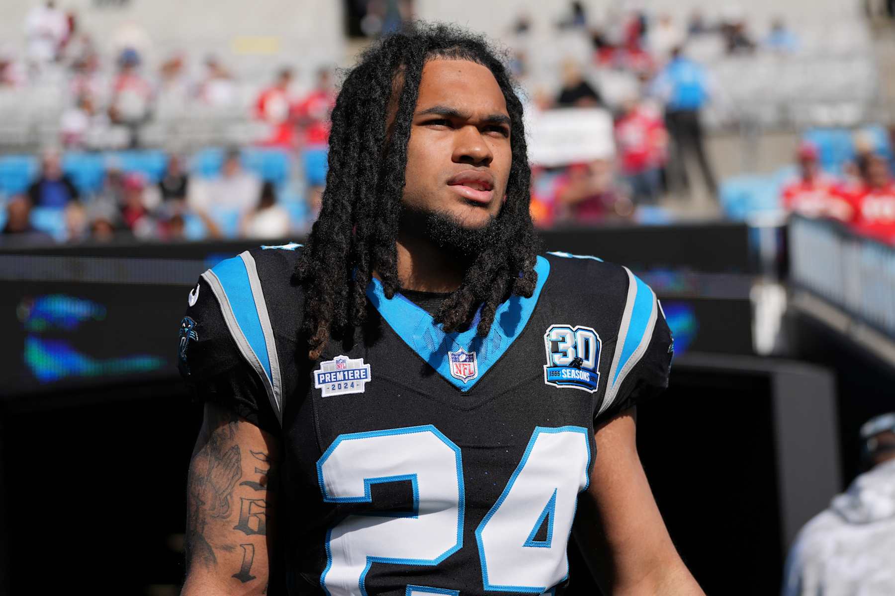 CHARLOTTE, NORTH CAROLINA - NOVEMBER 24: Jonathon Brooks #24 of the Carolina Panthers takes the field prior to a game against the Kansas City Chiefs at Bank of America Stadium on November 24, 2024 in Charlotte, North Carolina. (Photo by Grant Halverson/Getty Images)