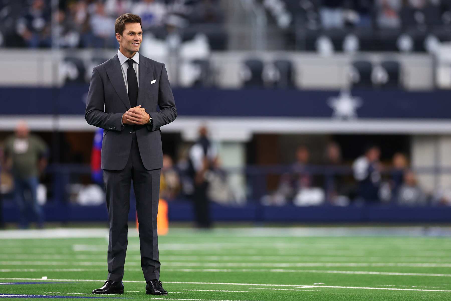 ARLINGTON, TEXAS - NOVEMBER 28: Tom Brady looks on prior to the game between the Dallas Cowboys and the New York Giants at AT&T Stadium on November 28, 2024 in Arlington, Texas. (Photo by Sam Hodde/Getty Images)