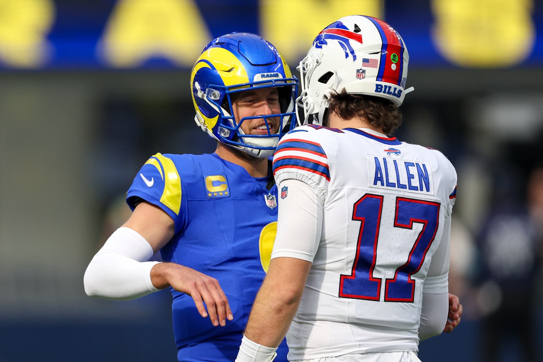 INGLEWOOD, CALIFORNIA - DECEMBER 08: Matthew Stafford #9 of the Los Angeles Rams talks with Josh Allen #17 of the Buffalo Bills before a game at SoFi Stadium on December 08, 2024 in Inglewood, California. (Photo by Harry How/Getty Images)