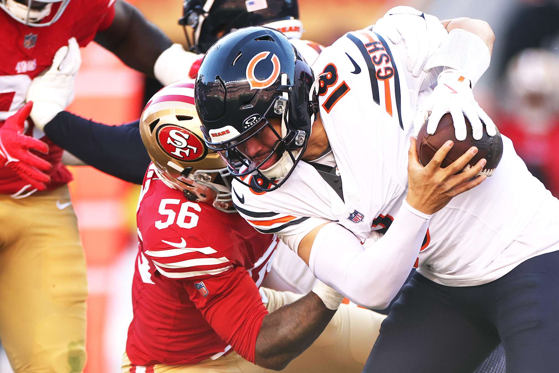SANTA CLARA, CALIFORNIA - DECEMBER 08: Leonard Floyd #56 of the San Francisco 49ers sacks Caleb Williams #18 of the Chicago Bears during the first quarter at Levi's Stadium on December 08, 2024 in Santa Clara, California. (Photo by Ezra Shaw/Getty Images)