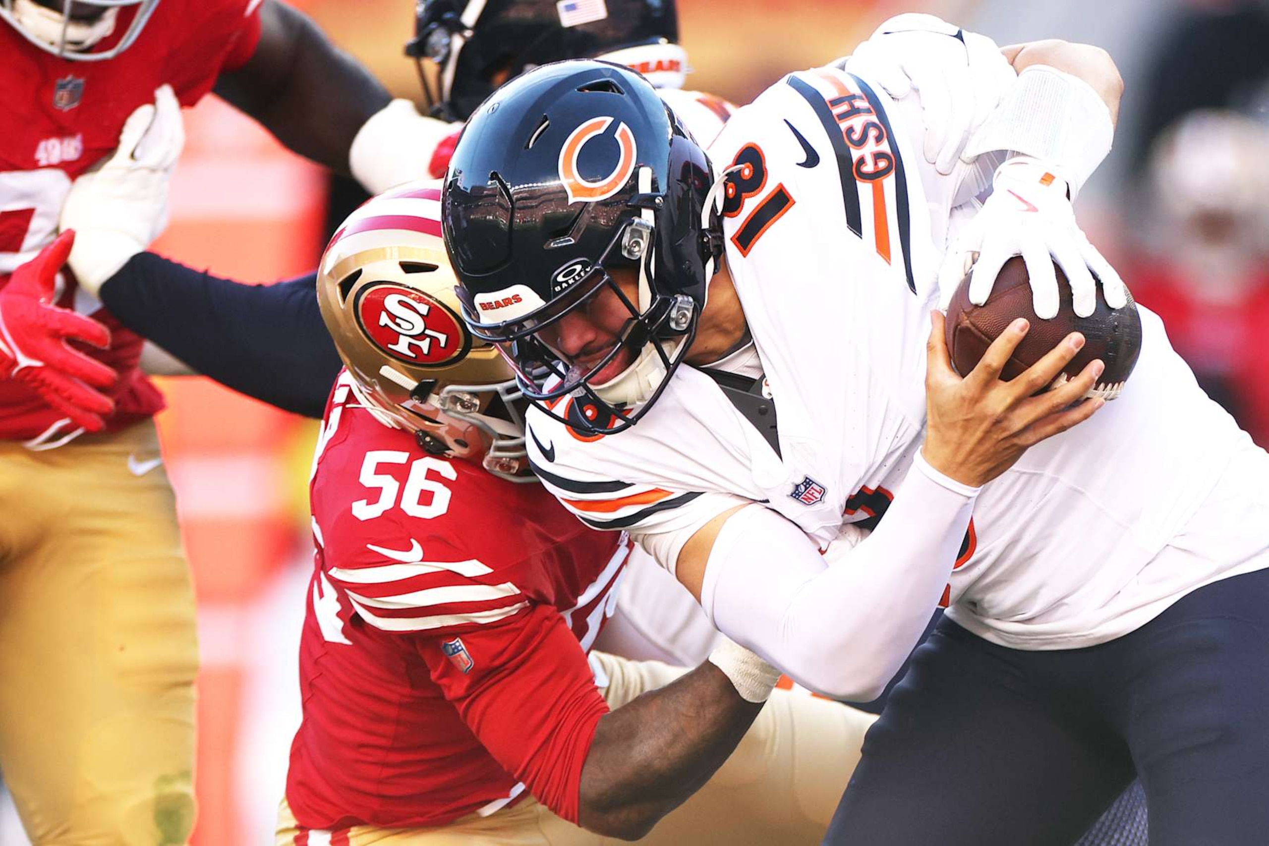 SANTA CLARA, CALIFORNIA - DECEMBER 08: Leonard Floyd #56 of the San Francisco 49ers sacks Caleb Williams #18 of the Chicago Bears during the first quarter at Levi's Stadium on December 08, 2024 in Santa Clara, California. (Photo by Ezra Shaw/Getty Images) SANTA CLARA, CALIFORNIA - DECEMBER 08: Leonard Floyd #56 of the San Francisco 49ers sacks Caleb Williams #18 of the Chicago Bears during the first quarter at Levi's Stadium on December 08, 2024 in Santa Clara, California. (Photo by Ezra Shaw/Getty Images)