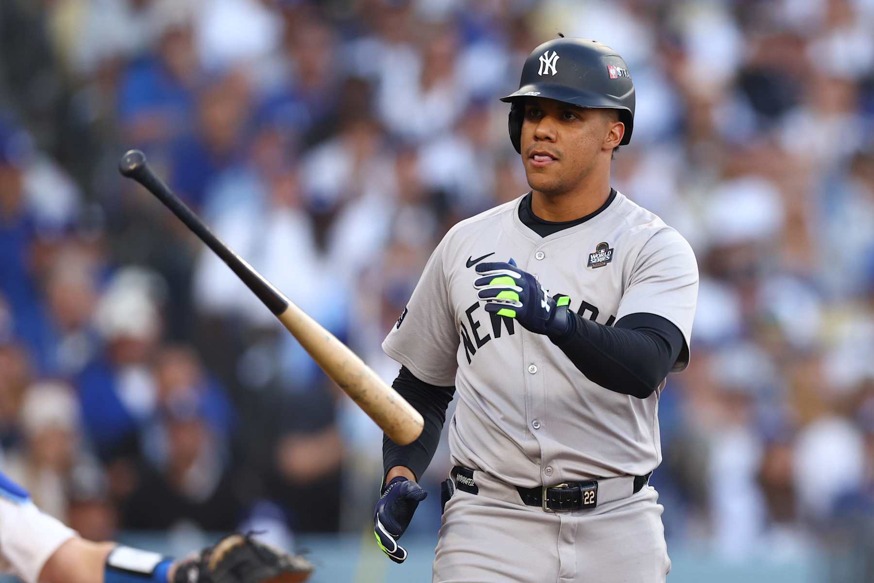 LOS ANGELES, CALIFORNIA - OCTOBER 25: Juan Soto #22 of the New York Yankees tosses his bat after drawing a walk in the first inning against the Los Angeles Dodgers during Game One of the 2024 World Series at Dodger Stadium on October 25, 2024 in Los Angeles, California. (Photo by Maddie Meyer/Getty Images)