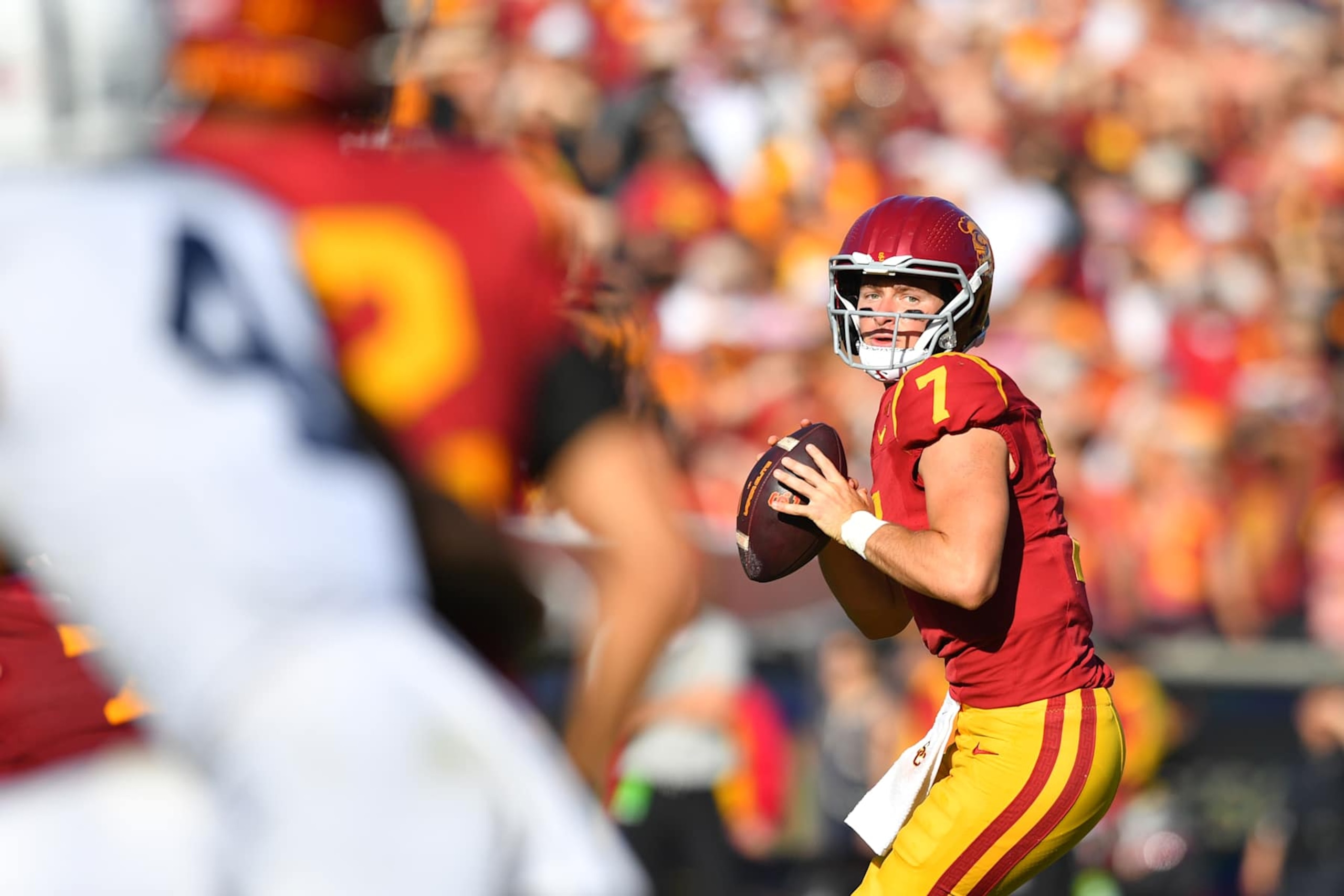LOS ANGELES, CA - OCTOBER 12: USC Trojans quarterback Miller Moss (7) drops back to pass during a college football game between the Penn State Nittany Lions and the USC Trojans on October 12, 2024, at Los Angeles Memorial Coliseum in Los Angeles, CA. (Photo by Brian Rothmuller/Icon Sportswire via Getty Images)