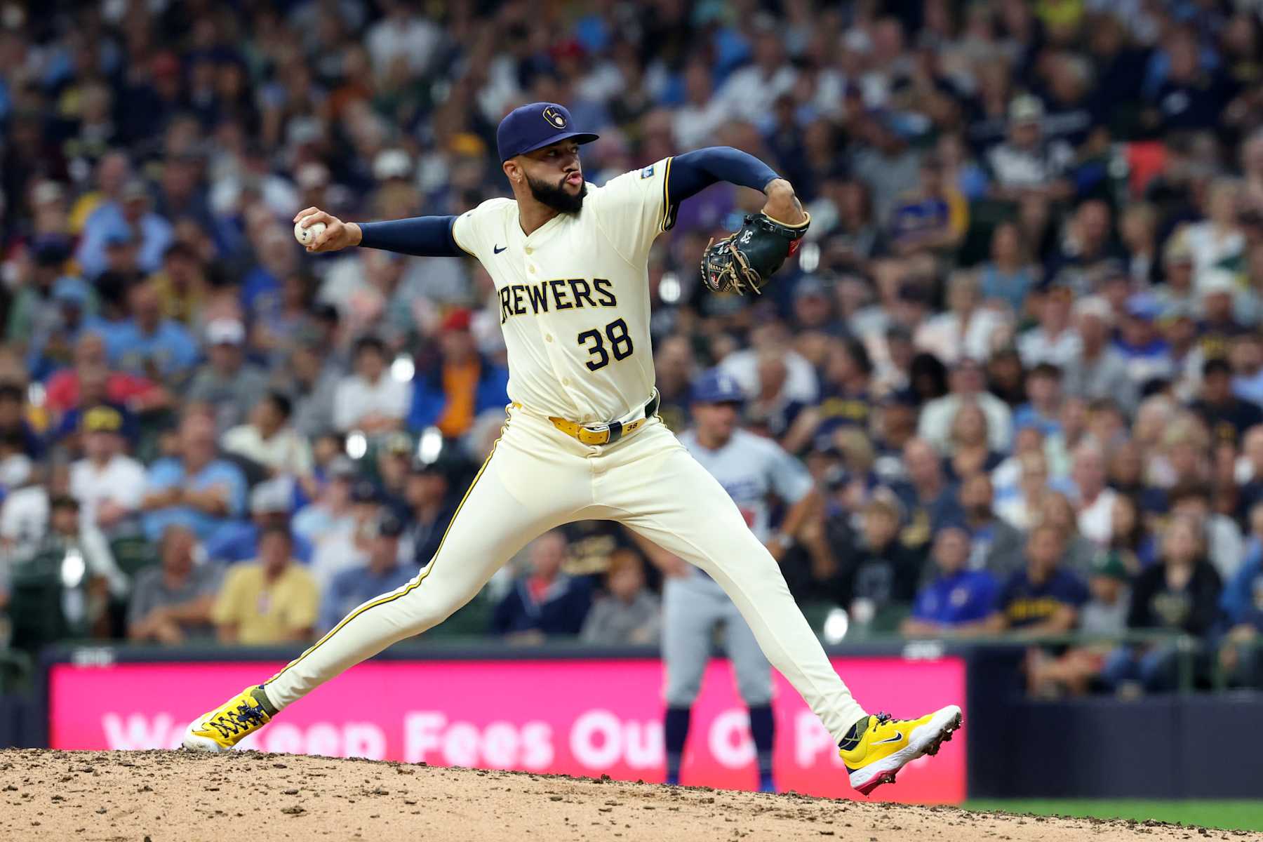 MILWAUKEE, WI - AUGUST 15: Milwaukee Brewers relief pitcher Devin Williams (38) pitches during the ninth inning of a MLB baseball game between the Los Angeles Dodgers and the Milwaukee Brewers on August 15, 2024, at American Family Field in Milwaukee, WI. (Photo by Kiyoshi Mio/Icon Sportswire via Getty Images)