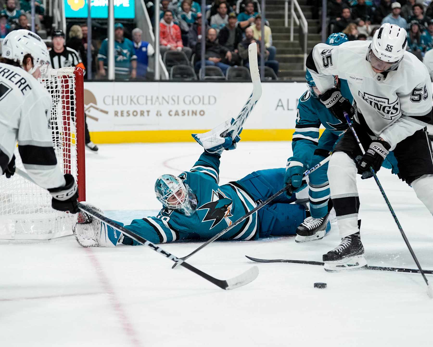 SAN JOSE, CALIFORNIA - NOVEMBER 25: Yaroslav Askarov #30 of the San Jose Sharks makes a diving save during the second period against the Los Angeles Kings at SAP Center on November 25, 2024 in San Jose, California. (Photo by Andreea Cardani/NHLI via Getty Images)