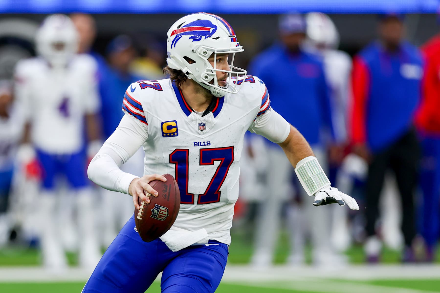 INGLEWOOD, CALIFORNIA - DECEMBER 08: Josh Allen #17 of the Buffalo Bills scrambles in the second quarter of a game against the Los Angeles Rams at SoFi Stadium on December 08, 2024 in Inglewood, California. (Photo by Katelyn Mulcahy/Getty Images)