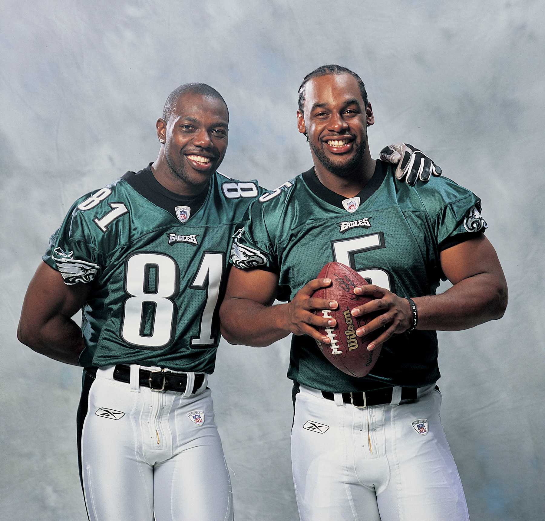 Nov 08, 2005; Philadelphia, PA, USA; ! 'Mags and TV Call for Price'! NFL Football: FILE PHOTO: Philly Eagles wide receiver TERRELL OWENS, 31, (L) has been deactivated for the remaining four games of the NFL season for 'conduct detrimental to the team.' When asked by a television interviewer if the Eagles might be undefeated if they had Brett Favre quarterbacking them rather than Donovan McNabb, Owens agreed and further contended that the Philadelphia club had not properly recognized his feat of scoring 100 career touchdowns. FILE PHOTO: Aug. 2, 2004; TERRELL OWENS and quarterback DONOVAN MCNABB (R).  (Photo by Bob Leverone/Sporting News via Getty Images via Getty Images)