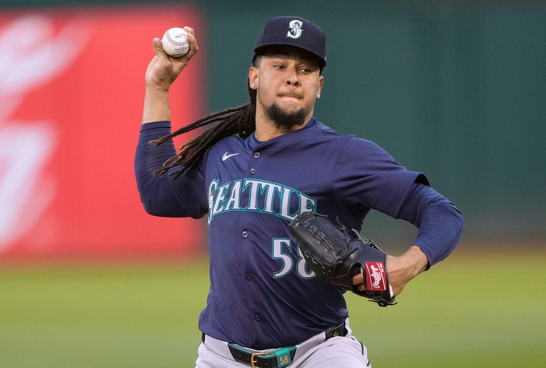 OAKLAND, CALIFORNIA - SEPTEMBER 03: Luis Castillo #58 of the Seattle Mariners pitches against the Oakland Athletics in the bottom of the first inning at the Oakland Coliseum on September 3, 2024 in Oakland, California. (Photo by Thearon W. Henderson/Getty Images)