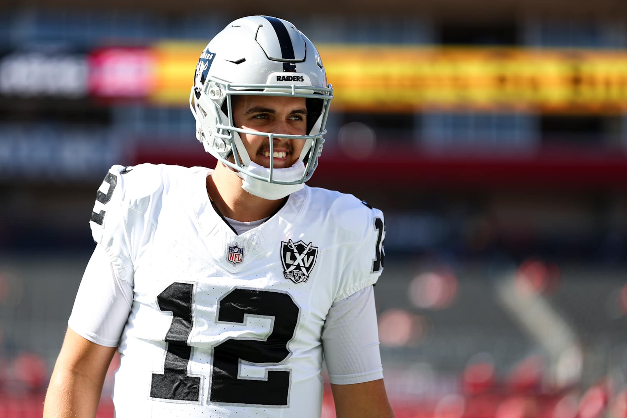 TAMPA, FLORIDA - DECEMBER 8: Aidan O'Connell #12 of the Las Vegas Raiders smiles prior to an NFL football game against the Tampa Bay Buccaneers at Raymond James Stadium on December 8, 2024 in Tampa, Florida. (Photo by Kevin Sabitus/Getty Images)