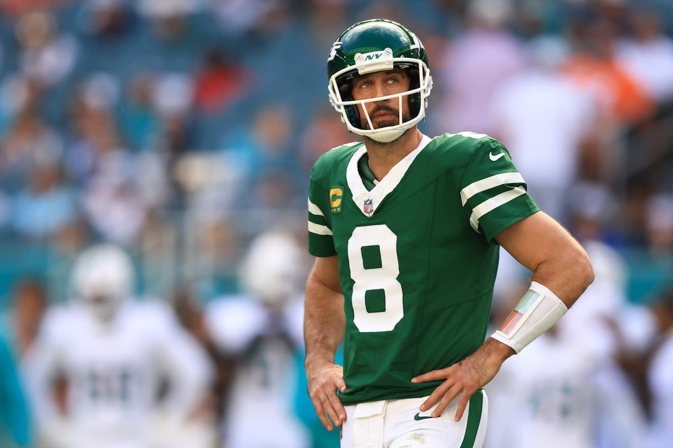 MIAMI GARDENS, FLORIDA - DECEMBER 08: Aaron Rodgers #8 of the New York Jets reacts on the field during the first half of the game against the Miami Dolphins at Hard Rock Stadium on December 08, 2024 in Miami Gardens, Florida. (Photo by Megan Briggs/Getty Images)