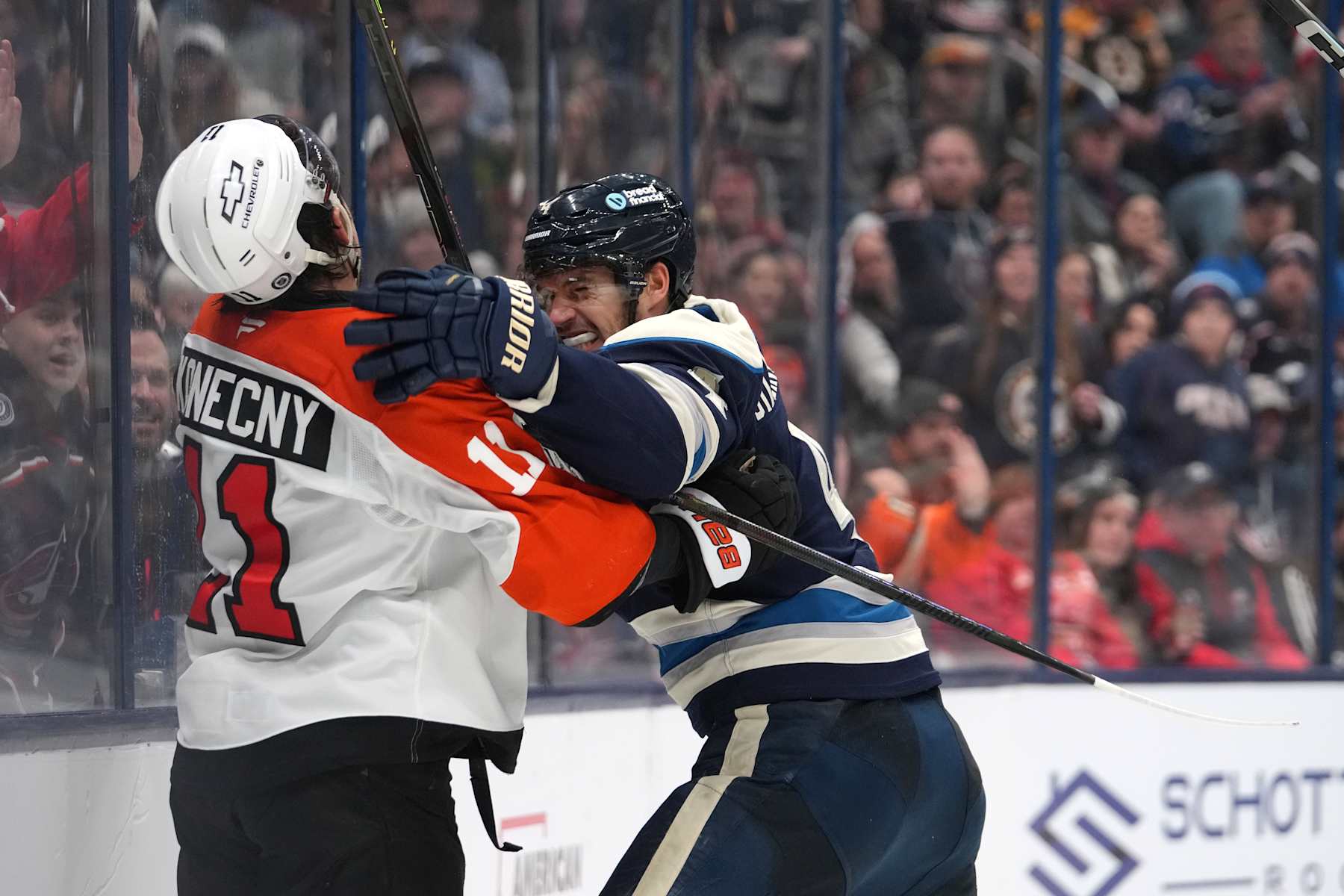 COLUMBUS, OHIO - DECEMBER 10: Cole Sillinger #4 of the Columbus Blue Jackets scrums with Travis Konecny #11 of the Philadelphia Flyers during the third period at Nationwide Arena on December 10, 2024 in Columbus, Ohio. (Photo by Jason Mowry/Getty Images)