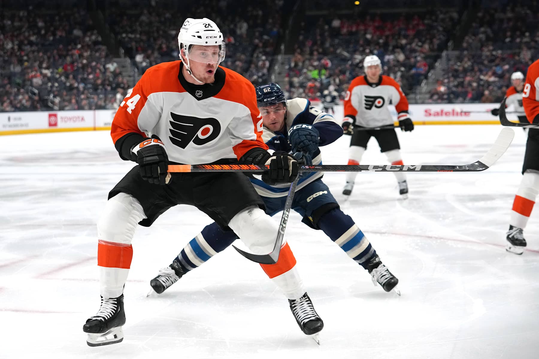 COLUMBUS, OHIO - DECEMBER 10: Nick Seeler #24 of the Philadelphia Flyers skates against Kevin Labanc #62 of the Columbus Blue Jackets during the second period at Nationwide Arena on December 10, 2024 in Columbus, Ohio. (Photo by Jason Mowry/Getty Images)