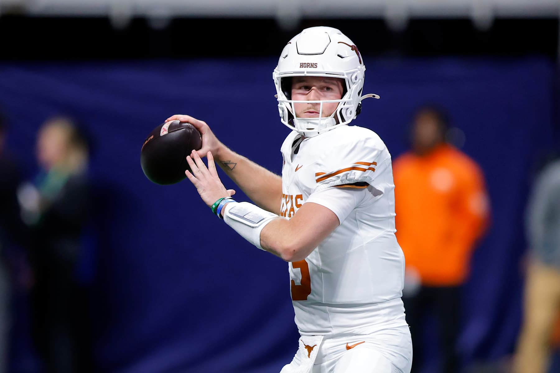 ATLANTA, GEORGIA - DECEMBER 07: Quinn Ewers #3 of the Texas Longhorns passes the ball against the Georgia Bulldogs during the first quarter of the 2024 SEC Championship at Mercedes-Benz Stadium on December 07, 2024 in Atlanta, Georgia. (Photo by Todd Kirkland/Getty Images)