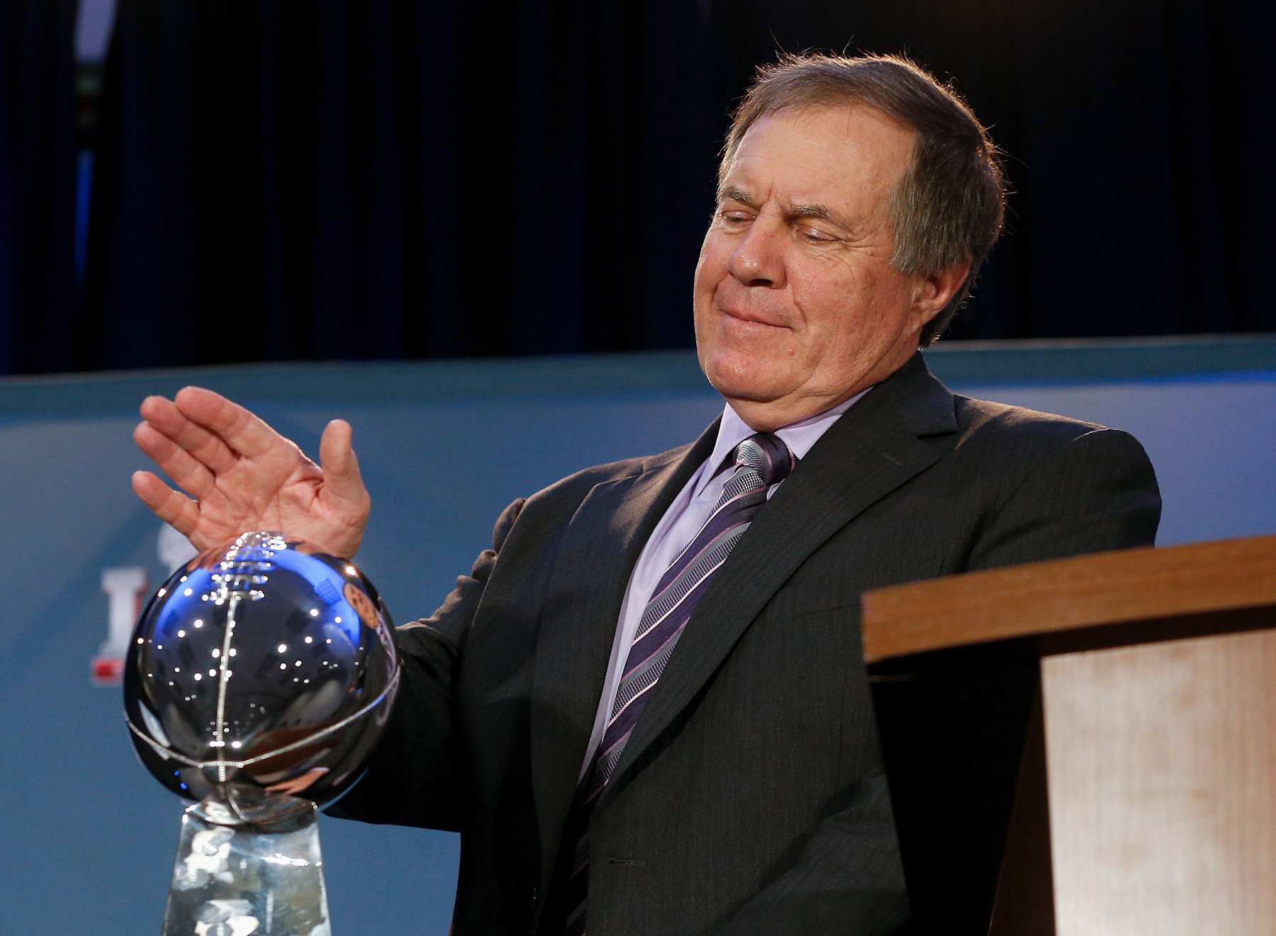 HOUSTON, TX - FEBRUARY 06:  Head coach Bill Belichick of the New England Patriots pats The Vince Lombardi at the Super Bowl Winner and MVP press conference on February 6, 2017 in Houston, Texas.  (Photo by Bob Levey/Getty Images)