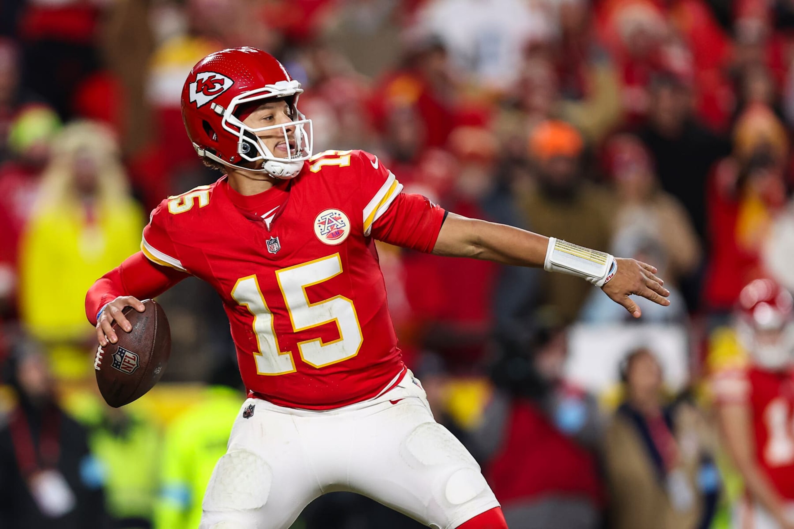 KANSAS CITY, MISSOURI - DECEMBER 08: Patrick Mahomes #15 of the Kansas City Chiefs throws the ball during an NFL football game against the Los Angeles Chargers at GEHA Field at Arrowhead Stadium on December 8, 2024 in Kansas City, Missouri. (Photo by Perry Knotts/Getty Images)