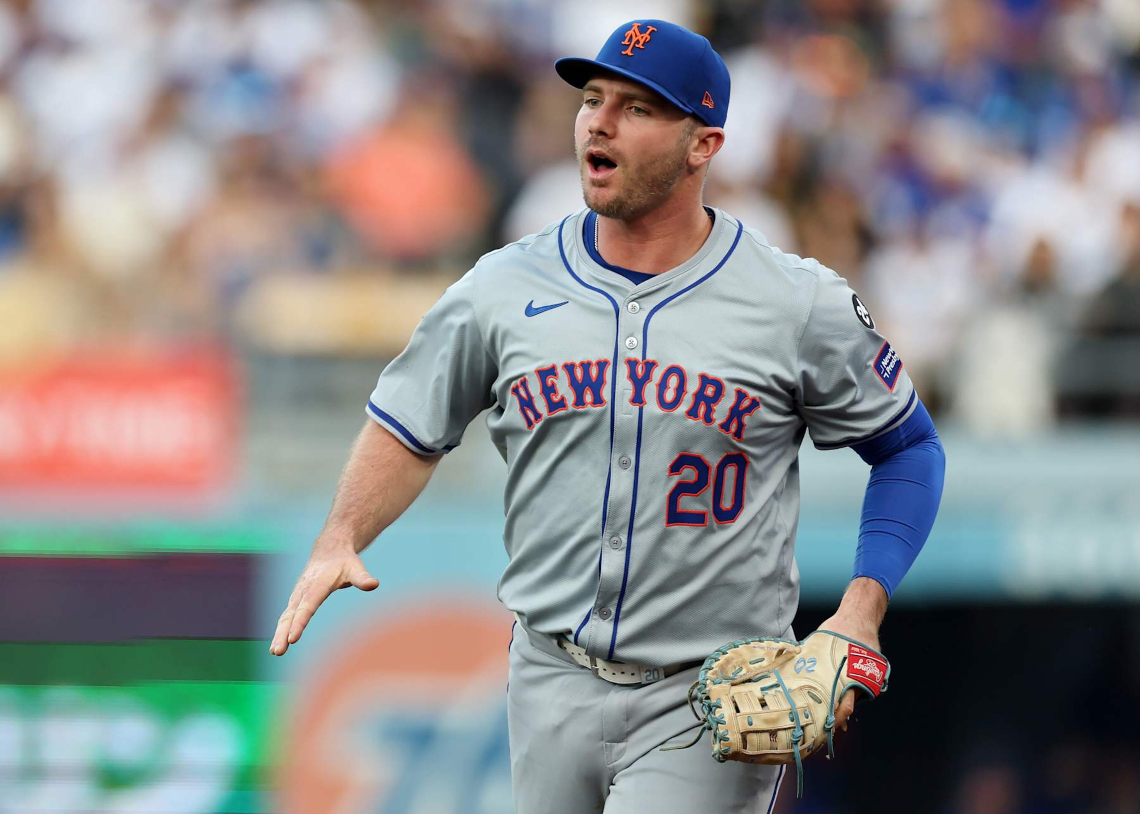 LOS ANGELES, CALIFORNIA - OCTOBER 20:  Pete Alonso #20 of the New York Mets reacts after catching a pop fly in foul territory to end the 1st inning during Game Six of the National League Championship Series against the Los Angeles Dodgers at Dodger Stadium on October 20, 2024 in Los Angeles, California. (Photo by Harry How/Getty Images)