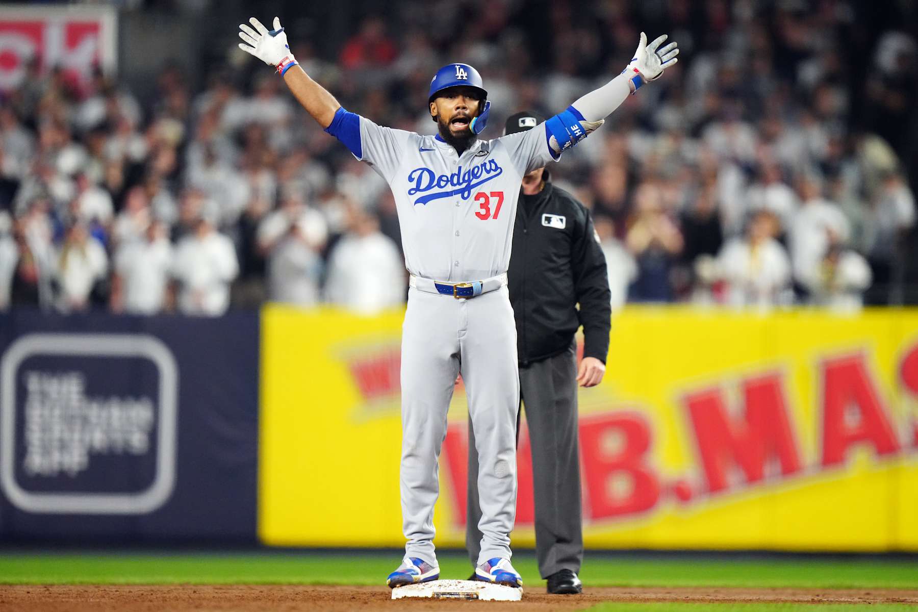 NEW YORK, NY - OCTOBER 30: Teoscar Hernández #37 of the Los Angeles Dodgers reacts after hitting a two-run double in the fifth inning during Game 5 of the 2024 World Series presented by Capital One between the Los Angeles Dodgers and the New York Yankees at Yankee Stadium on Wednesday, October 30, 2024 in New York, New York. (Photo by Daniel Shirey/MLB Photos via Getty Images)