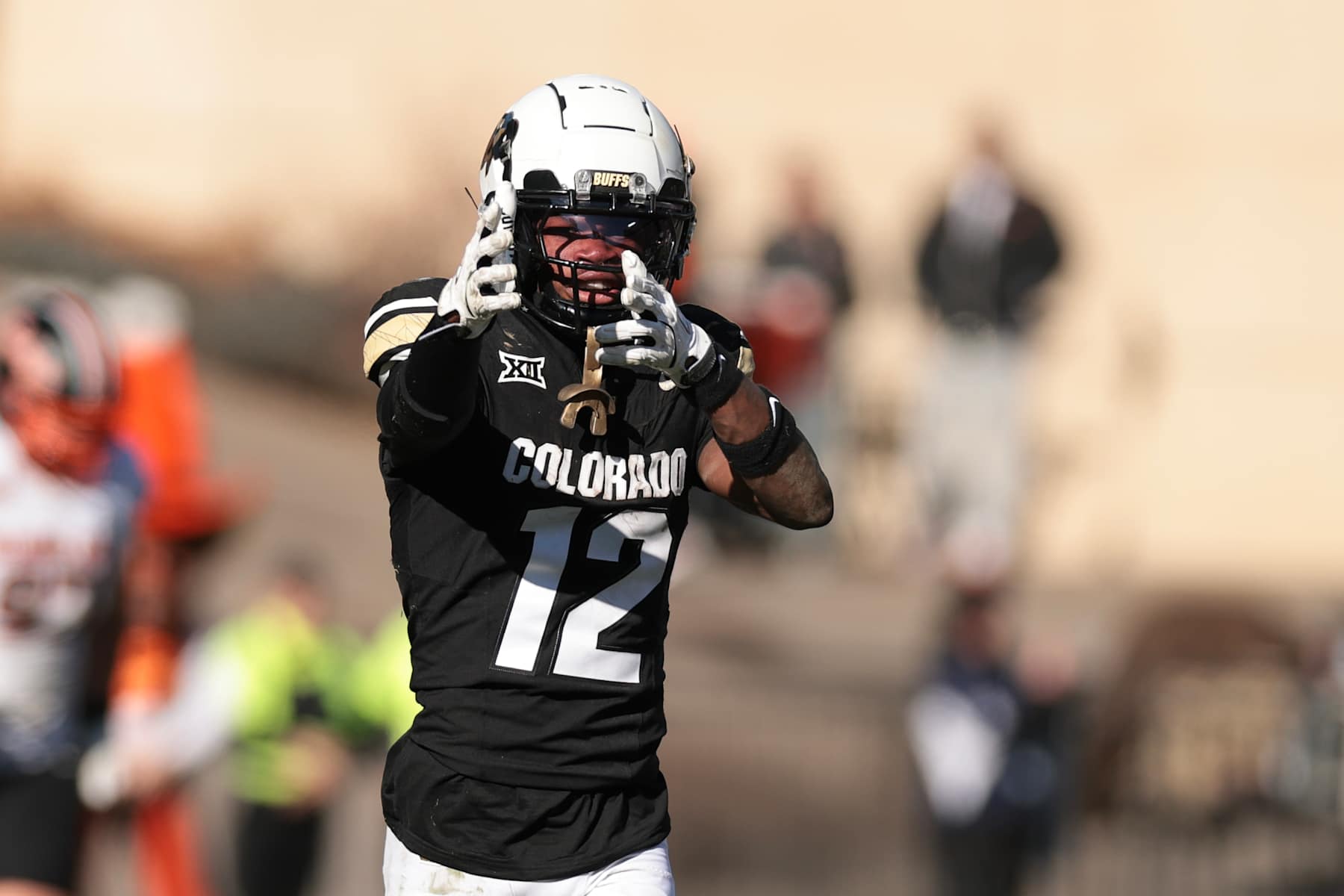 BOULDER, COLORADO - NOVEMBER 29: Travis Hunter #12 of the Colorado Buffaloes reacts after catching a pass during the fourth quarter against the Oklahoma State Cowboys at Folsom Field on November 29, 2024 in Boulder, Colorado. (Photo by Andrew Wevers/Getty Images)