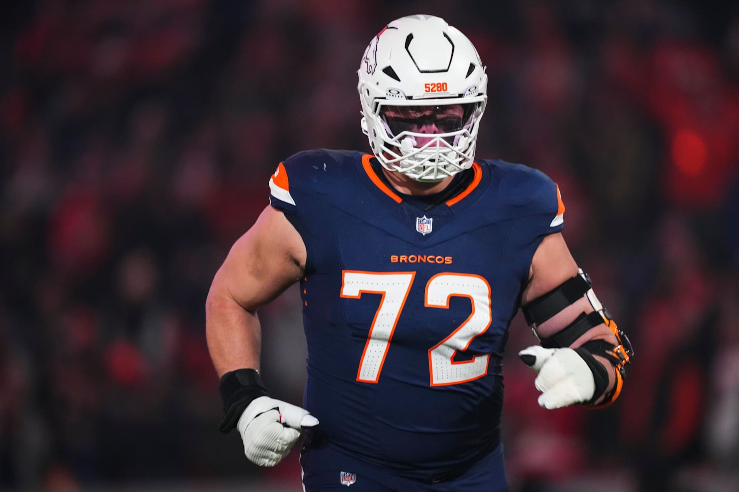 DENVER, CO - DECEMBER 02: Garett Bolles #72 of the Denver Broncos runs out of the tunnel prior to an NFL football game against the Cleveland Browns at Empower Field at Mile High on December 2, 2024 in Denver, Colorado. (Photo by Cooper Neill/Getty Images)