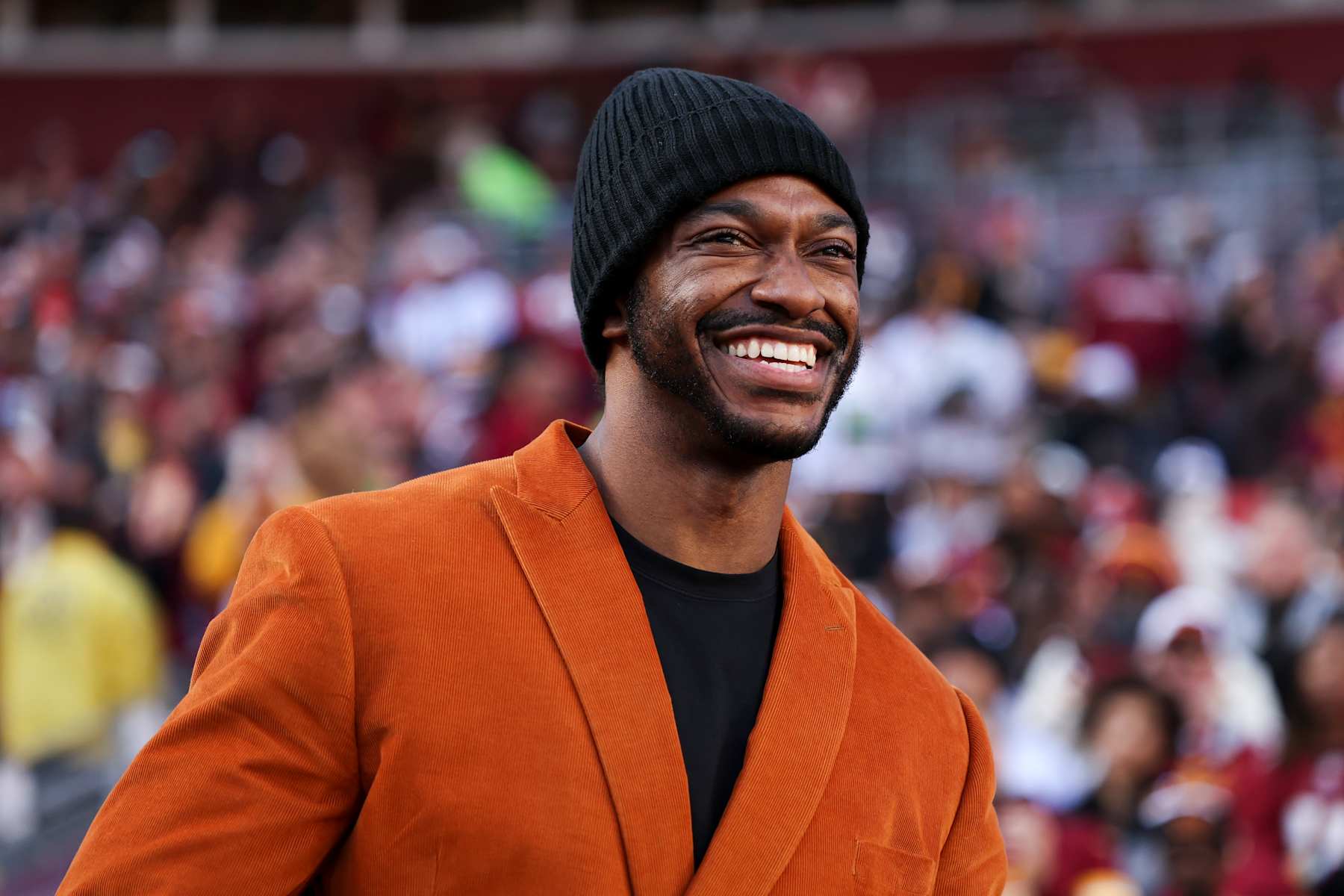 LANDOVER, MARYLAND - NOVEMBER 24: Former NFL quarterback Robert Griffin III is seen on the field during a game between the Dallas Cowboys and Washington Commanders at Northwest Stadium on November 24, 2024 in Landover, Maryland. The Cowboys defeated the Commanders 34-26. (Kara Durrette/Getty Images)