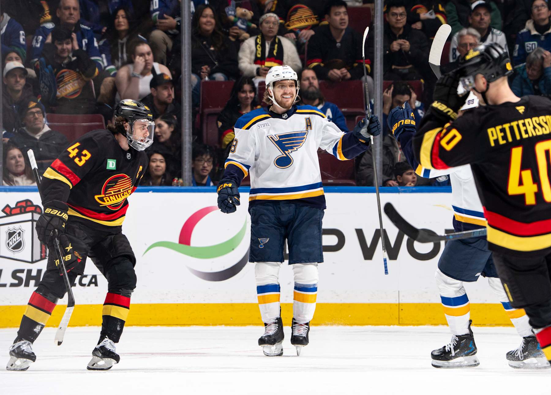 VANCOUVER, CANADA - DECEMBER 10: Robert Thomas #18 of the St. Louis Blues celebrates his goal during the first period of their NHL game against the Vancouver Canucks at Rogers Arena on December 10, 2024 in Vancouver, British Columbia, Canada. (Photo by Jeff Vinnick/NHLI via Getty Images)