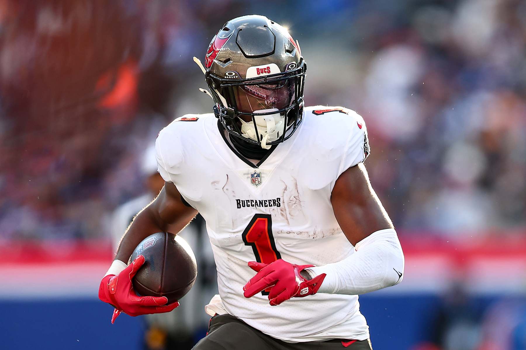 EAST RUTHERFORD, NEW JERSEY - NOVEMBER 24: Rachaad White #1 of the Tampa Bay Buccaneers carries the ball against the New York Giants during the first half at MetLife Stadium on November 24, 2024 in East Rutherford, New Jersey. (Photo by Dustin Satloff/Getty Images)