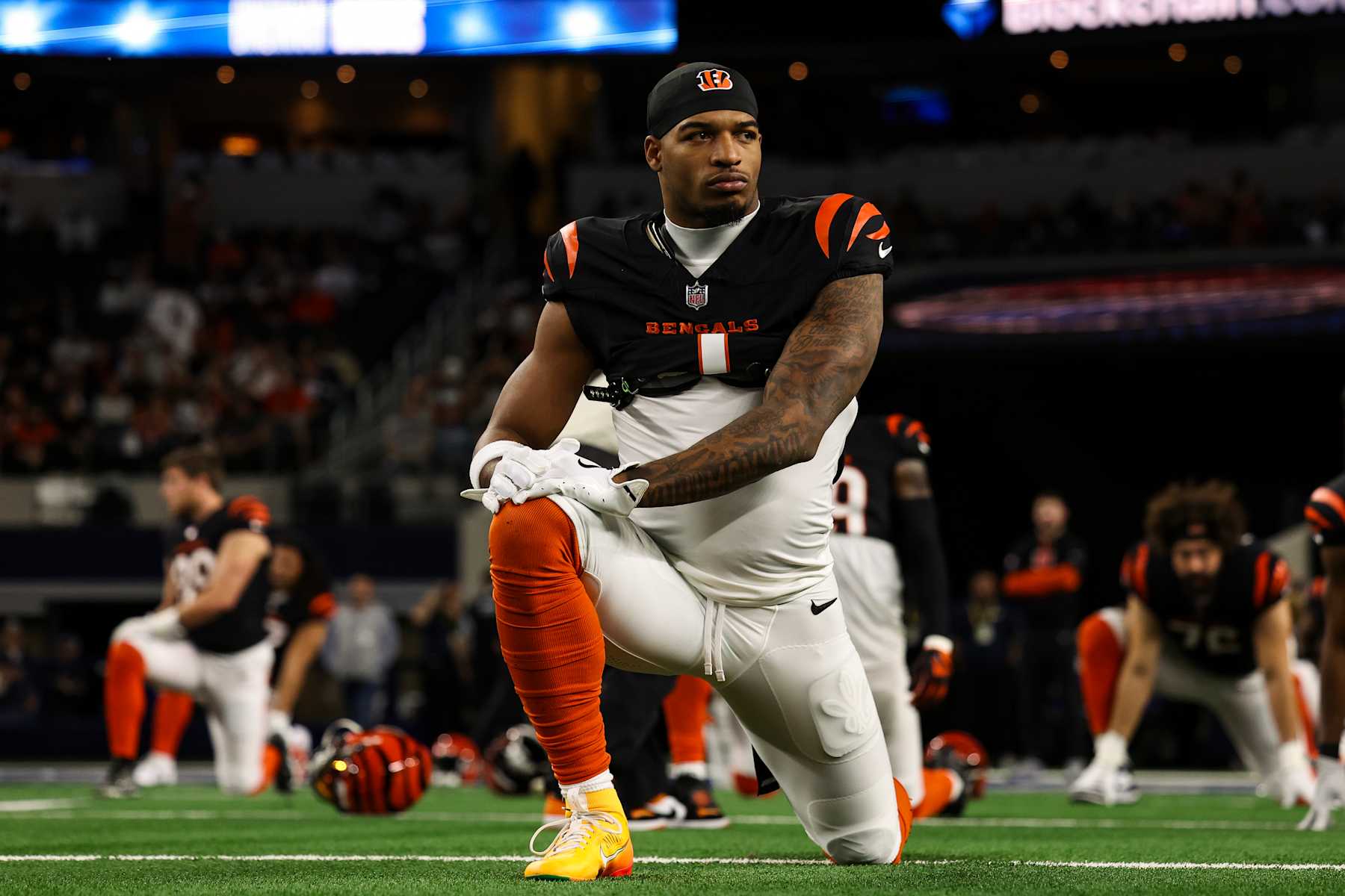 ARLINGTON, TEXAS - DECEMBER 09: Ja'Marr Chase #1 of the Cincinnati Bengals warms up prior to an NFL football game against the Dallas Cowboys at AT&T Stadium on December 9, 2024 in Arlington, Texas. (Photo by Perry Knotts/Getty Images)