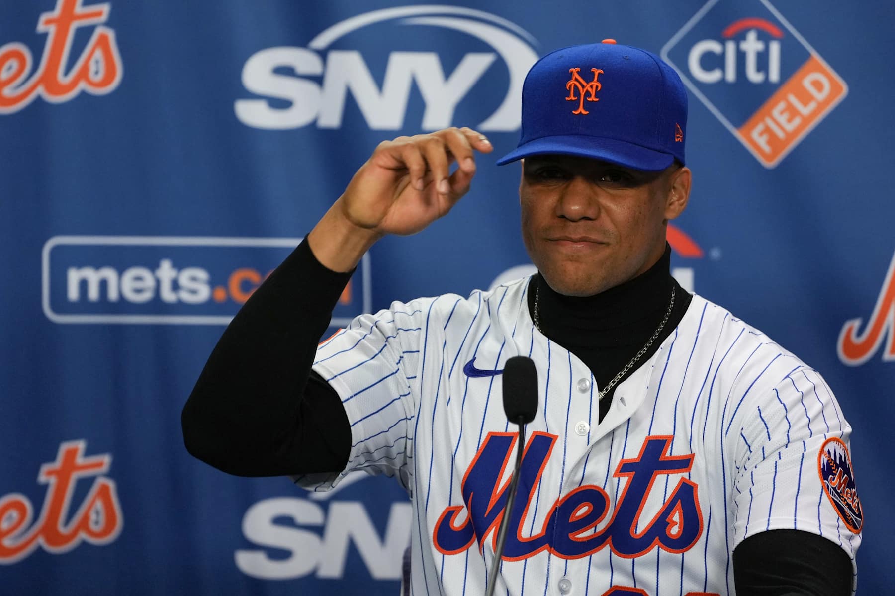 New York Mets Dominican superstar Juan Soto speaks at a press conference in New York on December 12, 2024. Soto joined the New York Mets on a record-breaking 15-year, $765 million deal on December 9. (Photo by DAVID DEE DELGADO / AFP) (Photo by DAVID DEE DELGADO/AFP via Getty Images)